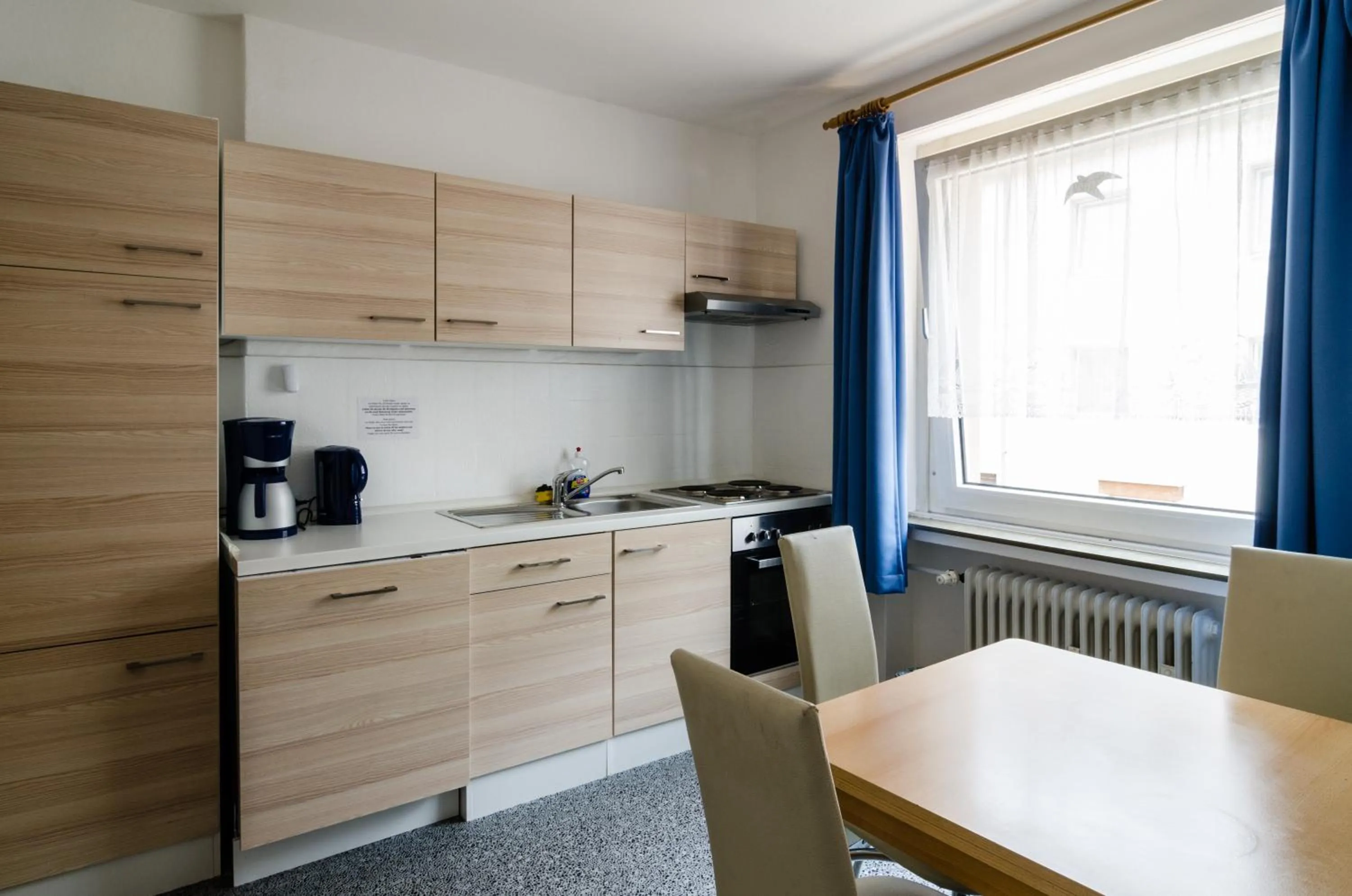 Kitchen or kitchenette in Altstadthotel Wienecke