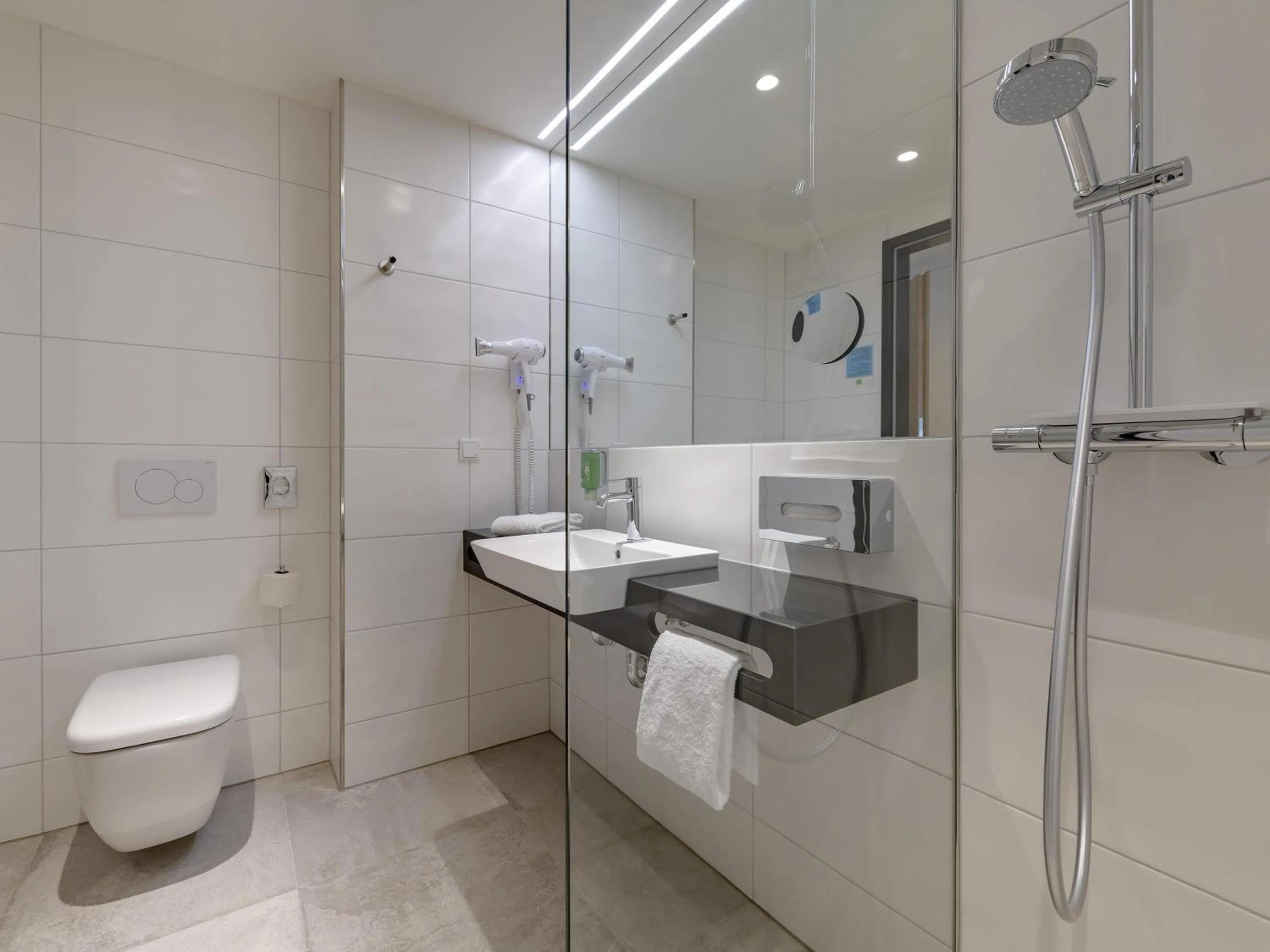 Bedroom in ibis Styles Bad Reichenhall