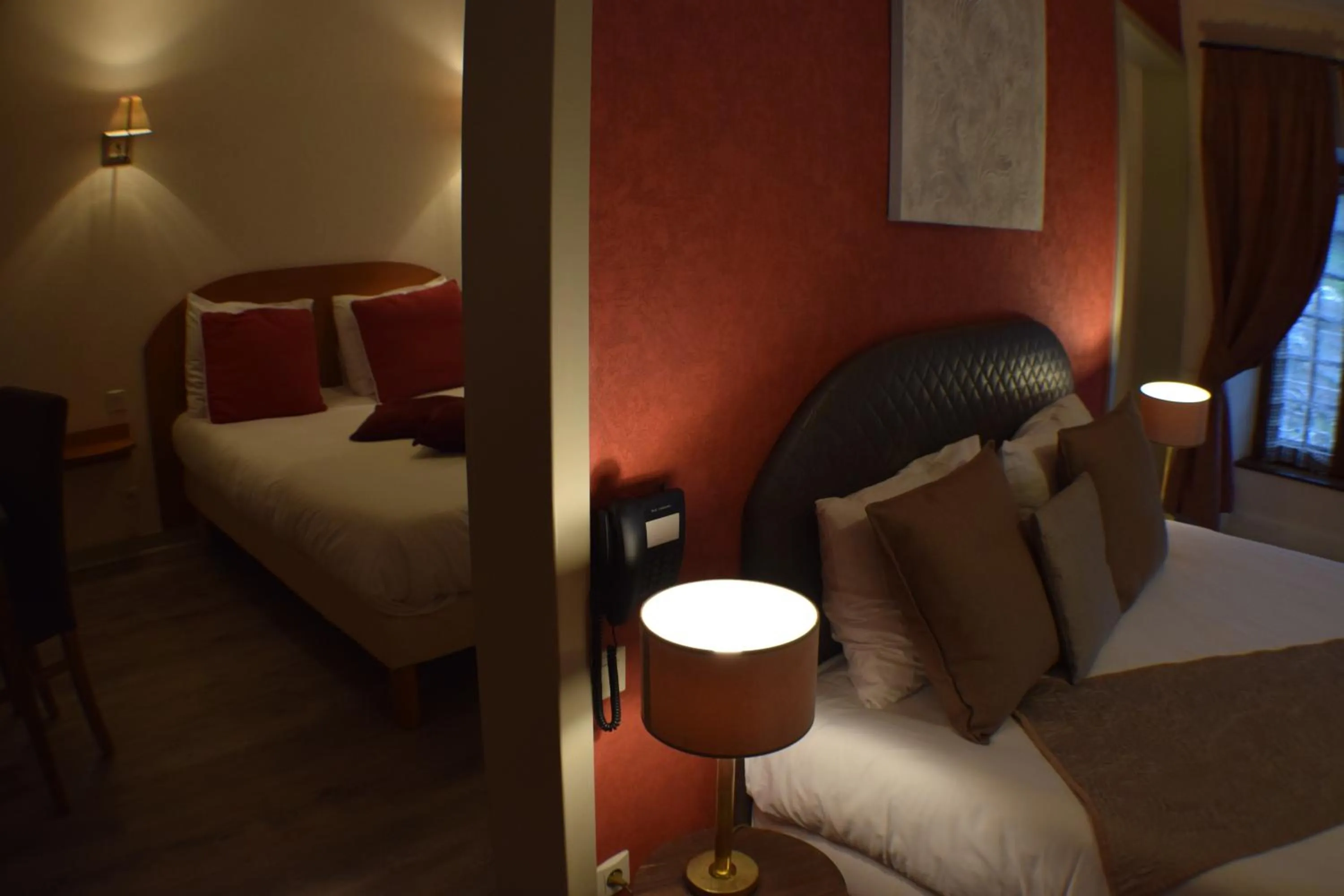 Bed in Logis Hôtel-Restaurant Le Relais