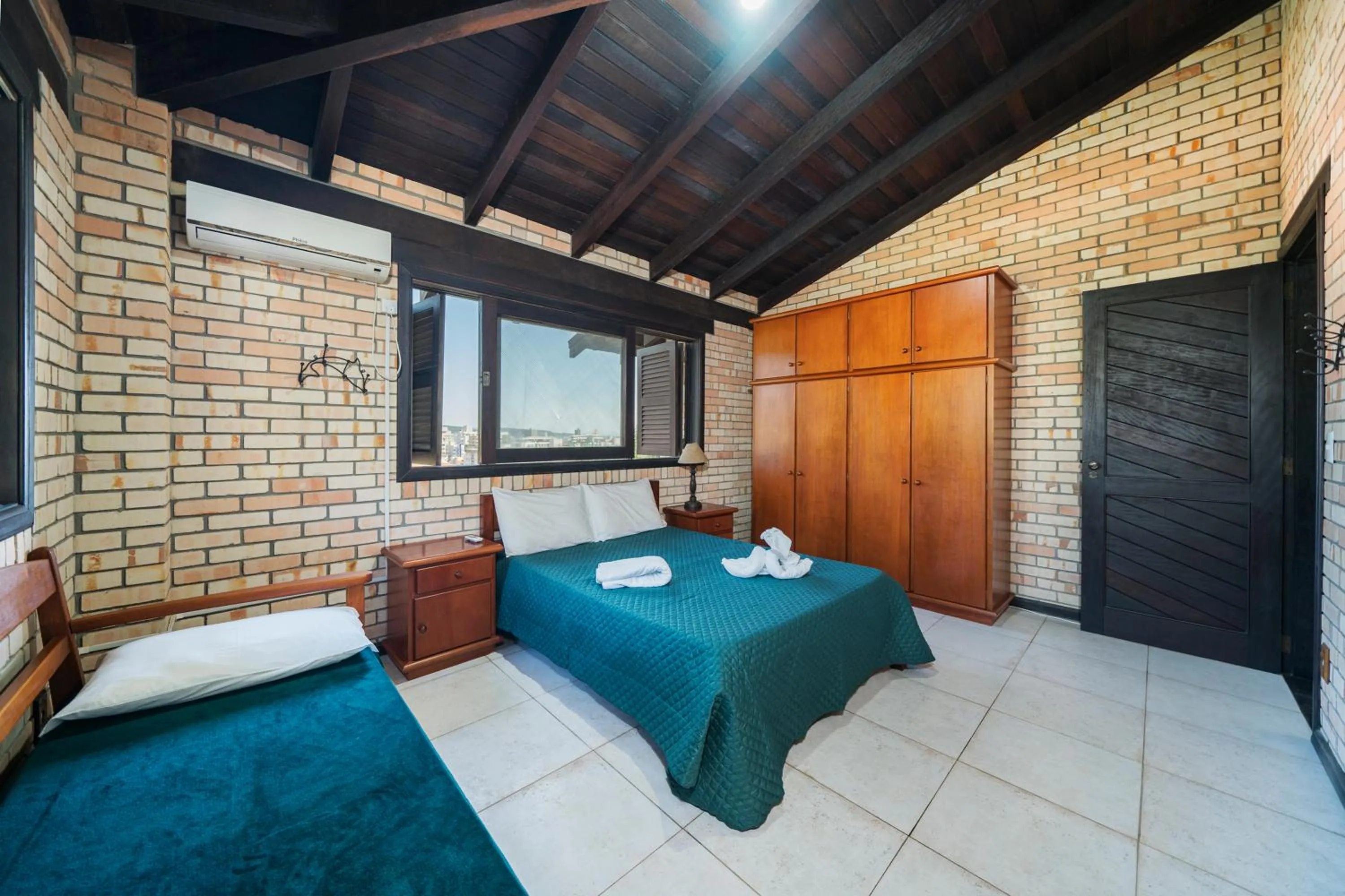 Bed in Pousada Albacora