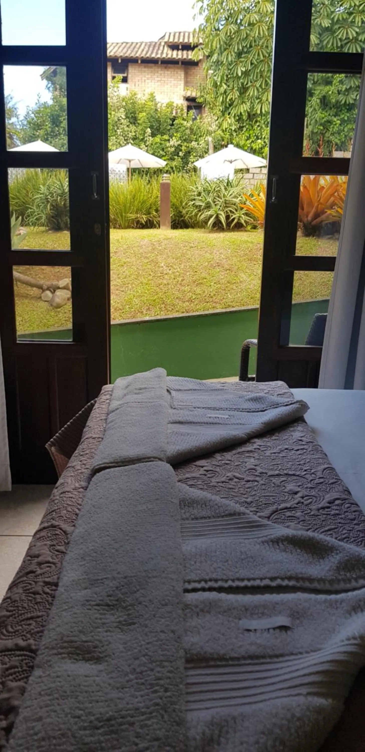 Bed in Pousada Guaruja