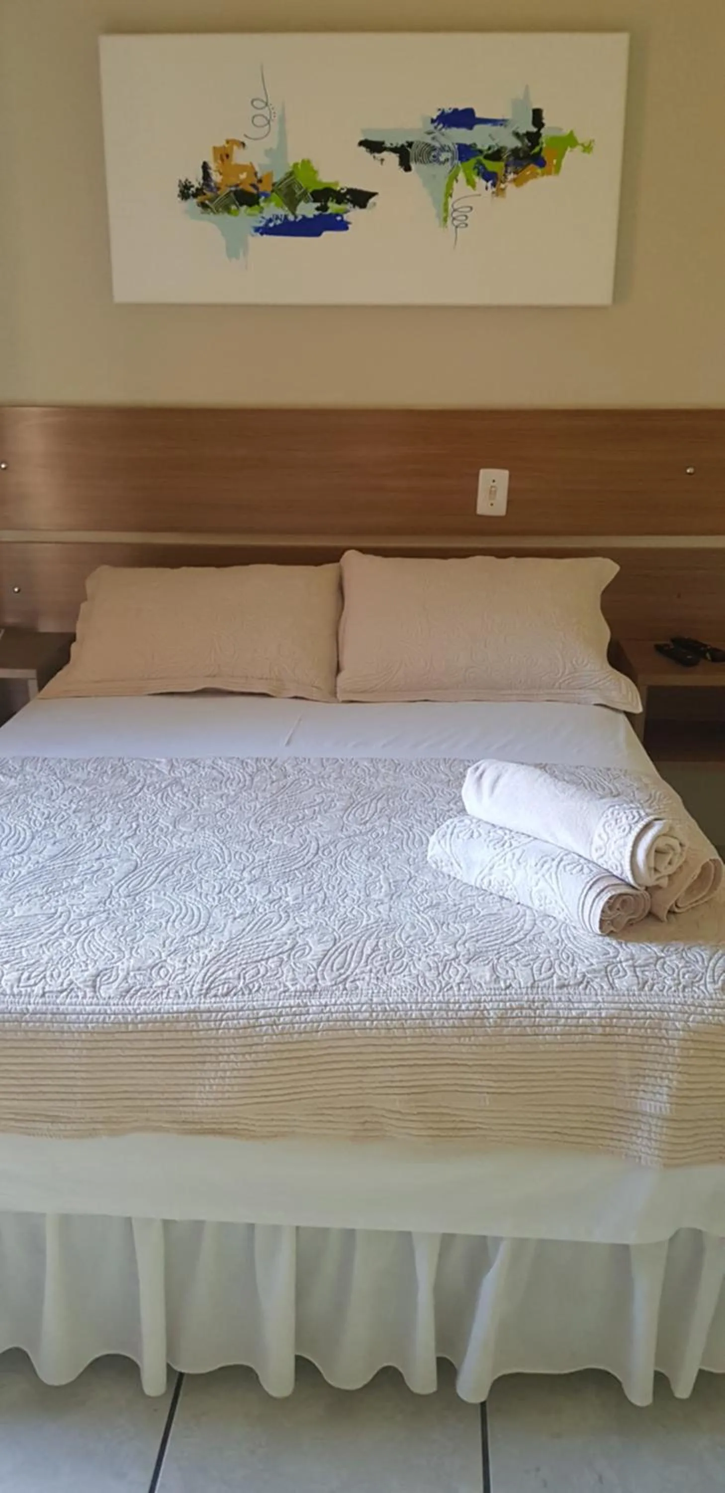 Bed in Pousada Guaruja