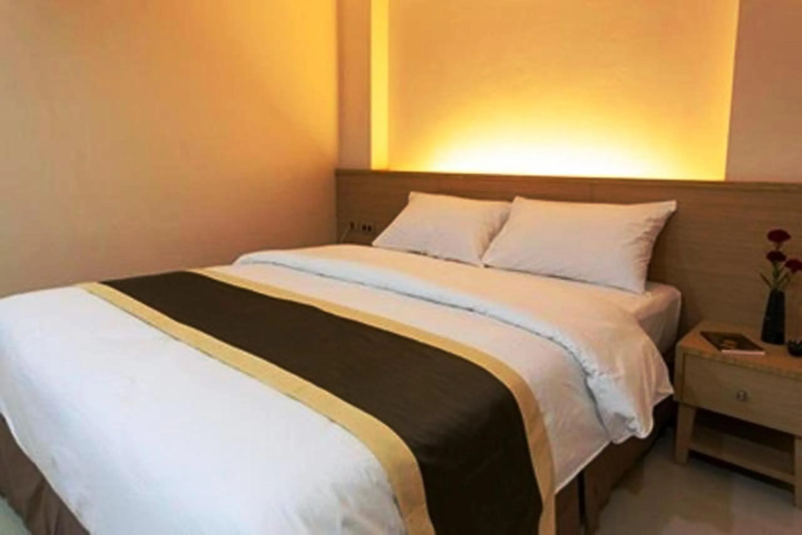 Bed in Gateway Hotel Pratunam