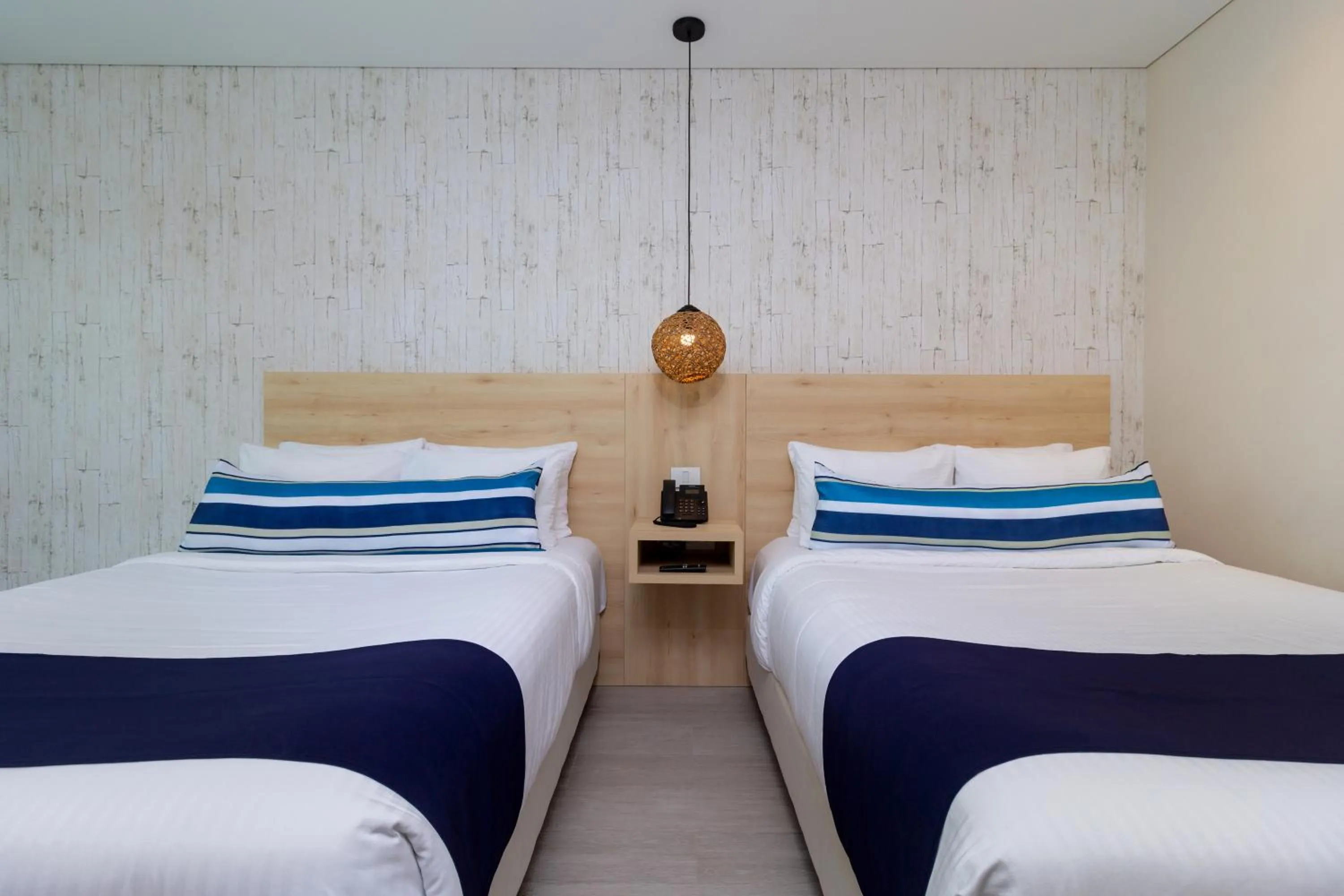 Bedroom, Bed in Aquamare Hotel