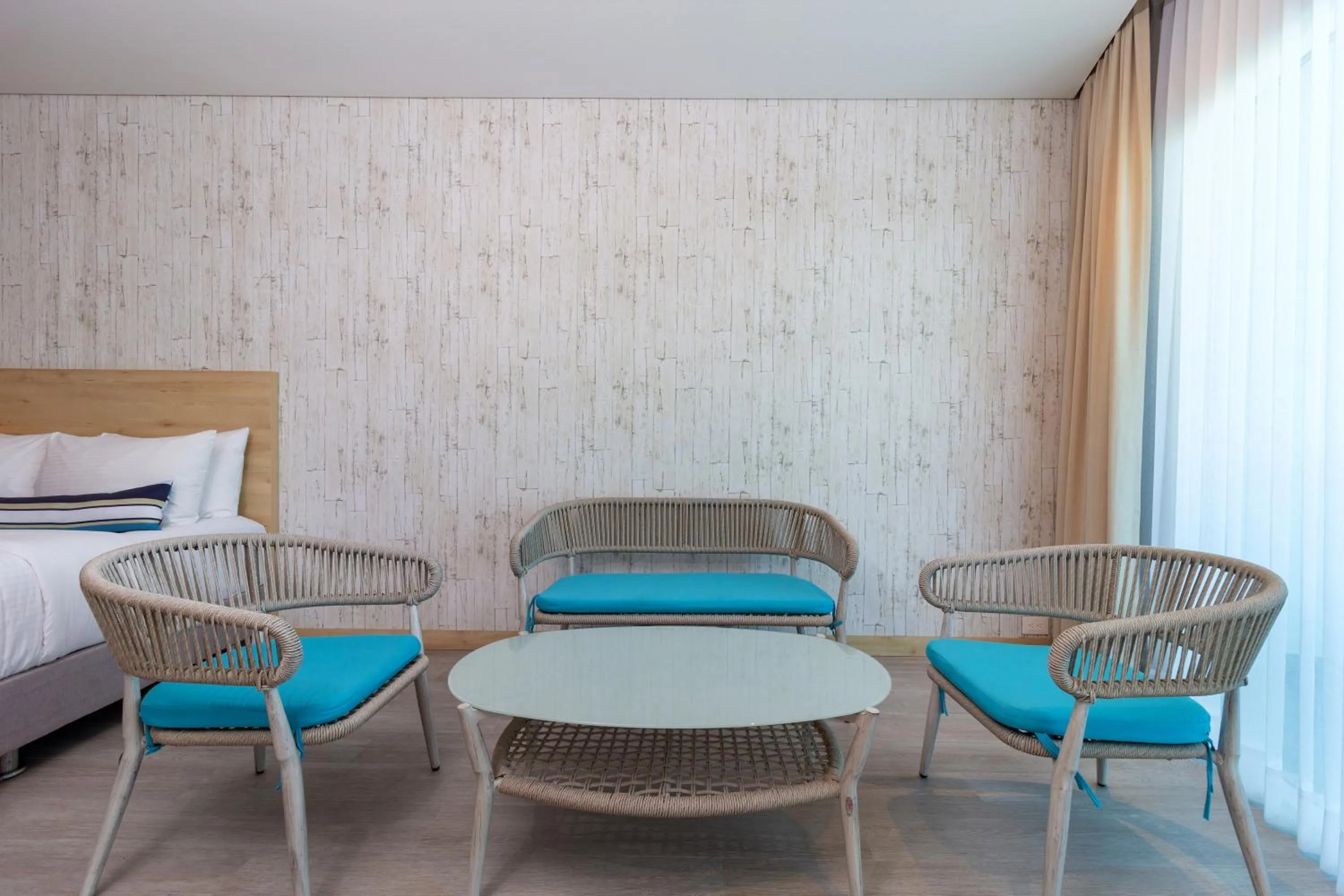 Living room, Bed in Aquamare Hotel