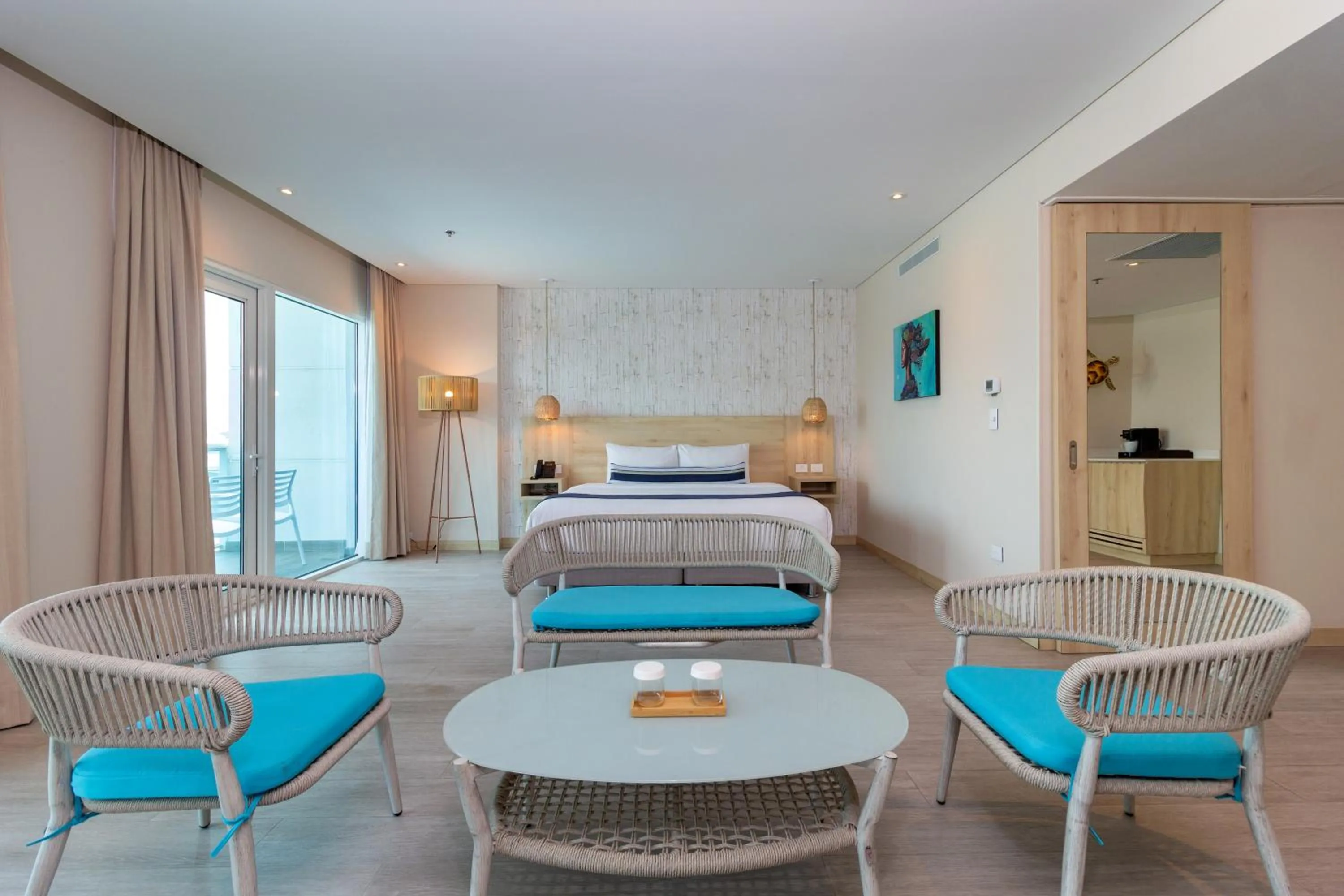 Living room, Bed in Aquamare Hotel