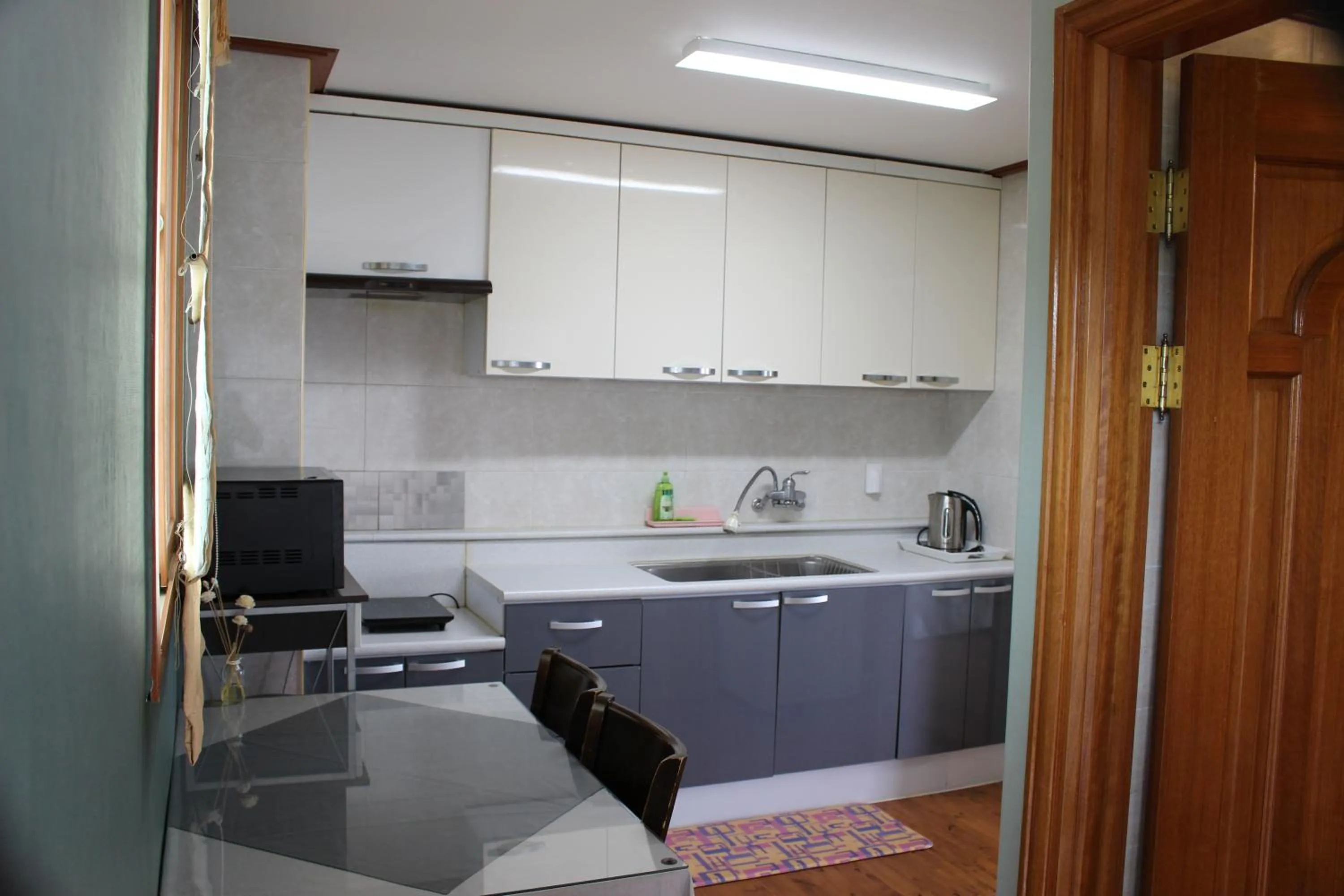 Kitchen or kitchenette in Jeju Feel House