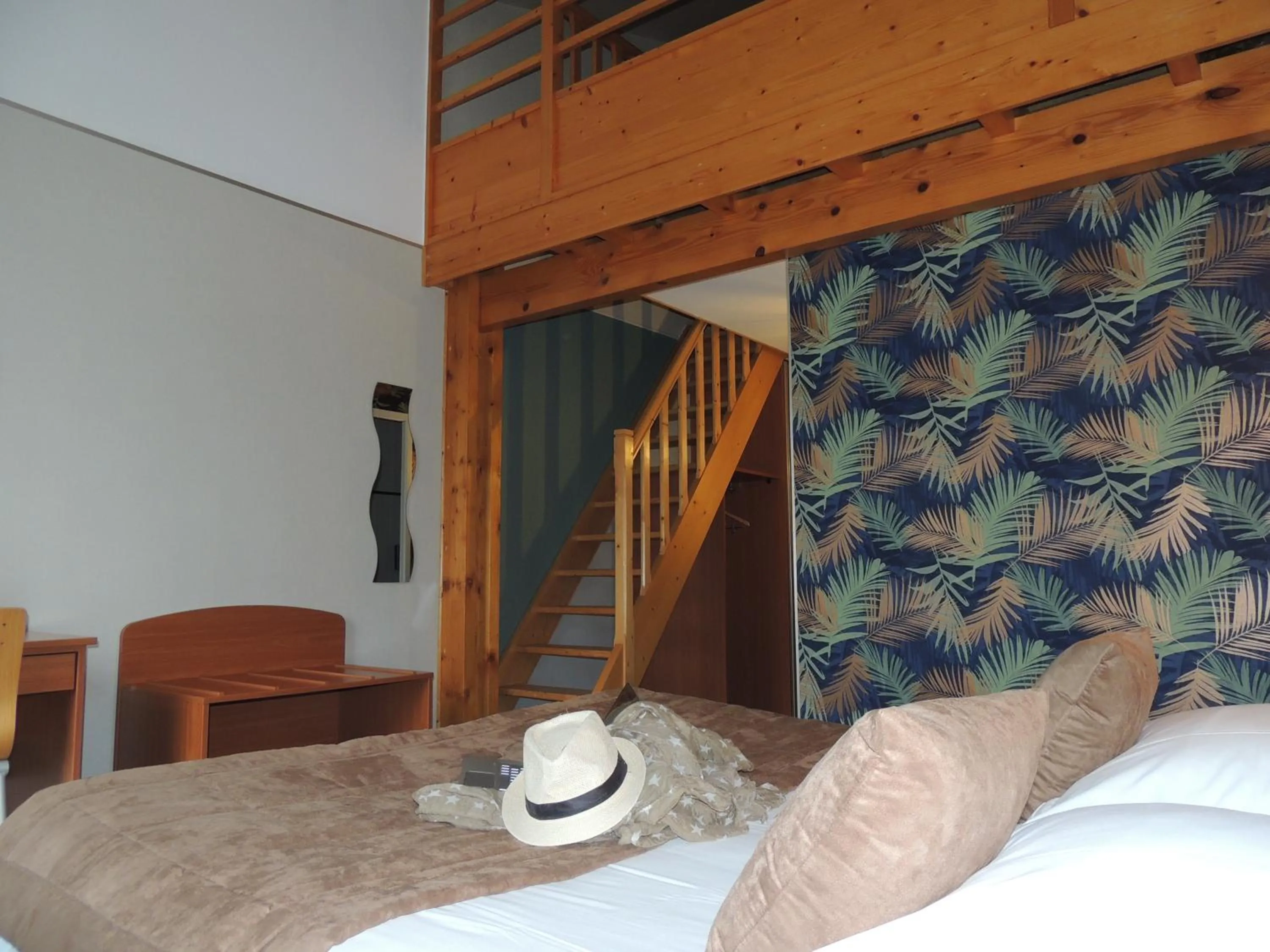 Photo of the whole room, Bed in LOGIS Hôtel LES 3 MARCHANDS