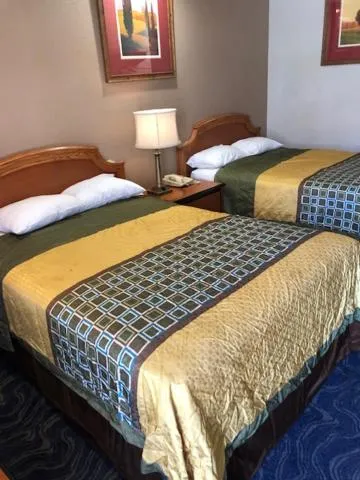 Bed in Crown Lodge Motel