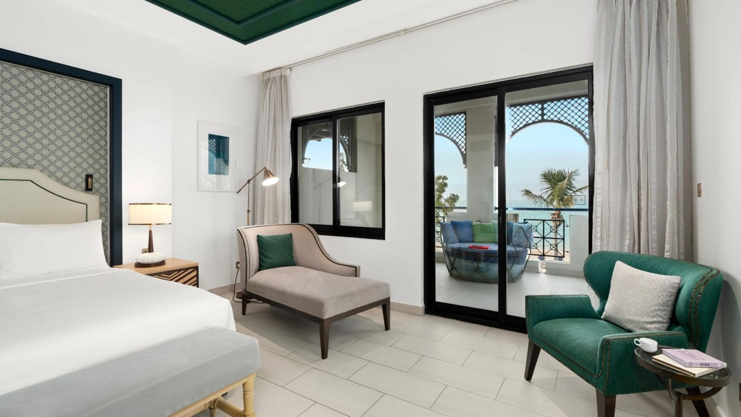 Balcony/Terrace, Bed in Hilton Ras Al Khaimah Beach Resort