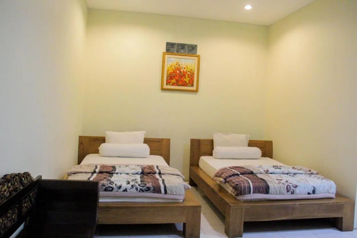 Bed in Putri Homestay