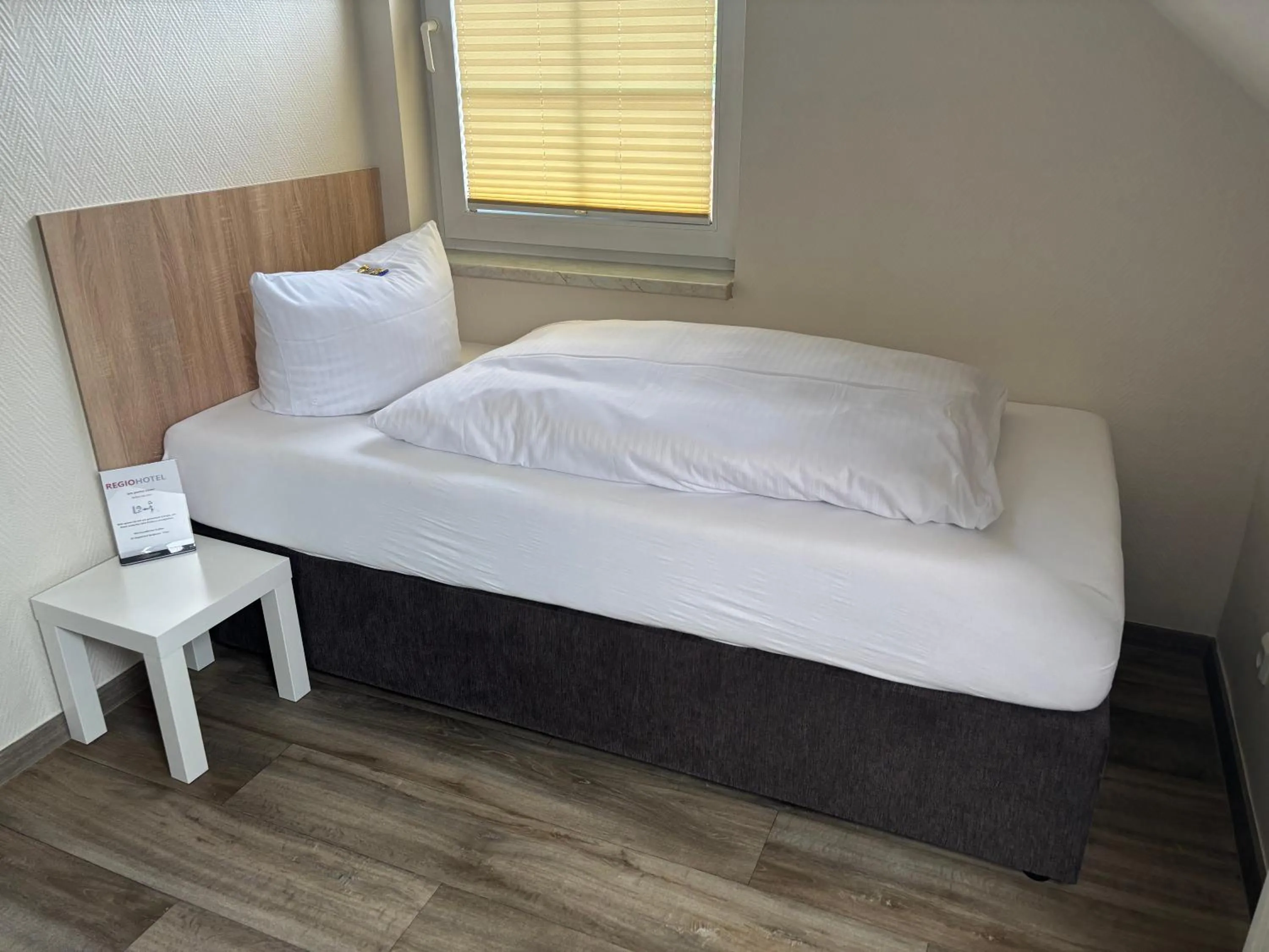 Photo of the whole room, Bed in REGIOHOTEL Pfälzer Hof Wernigerode - #Familienfreundlich #PreiswertÜbernachten #Harzurlaub #FreeParking