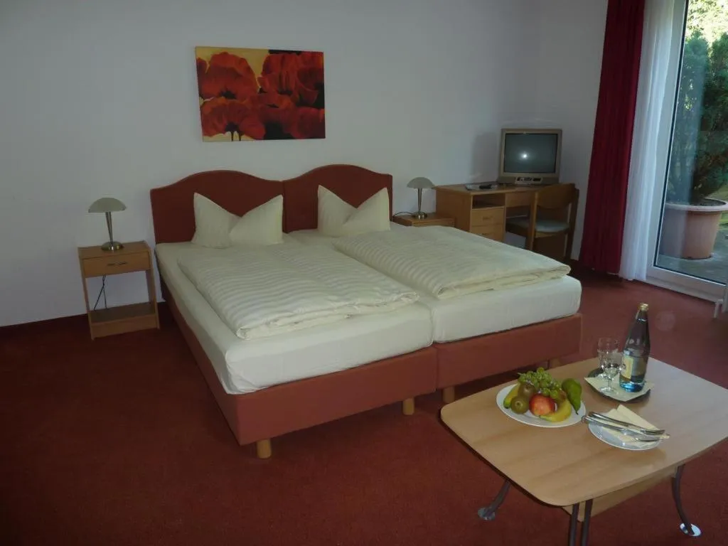 Bedroom in Hotel Grüner Jäger