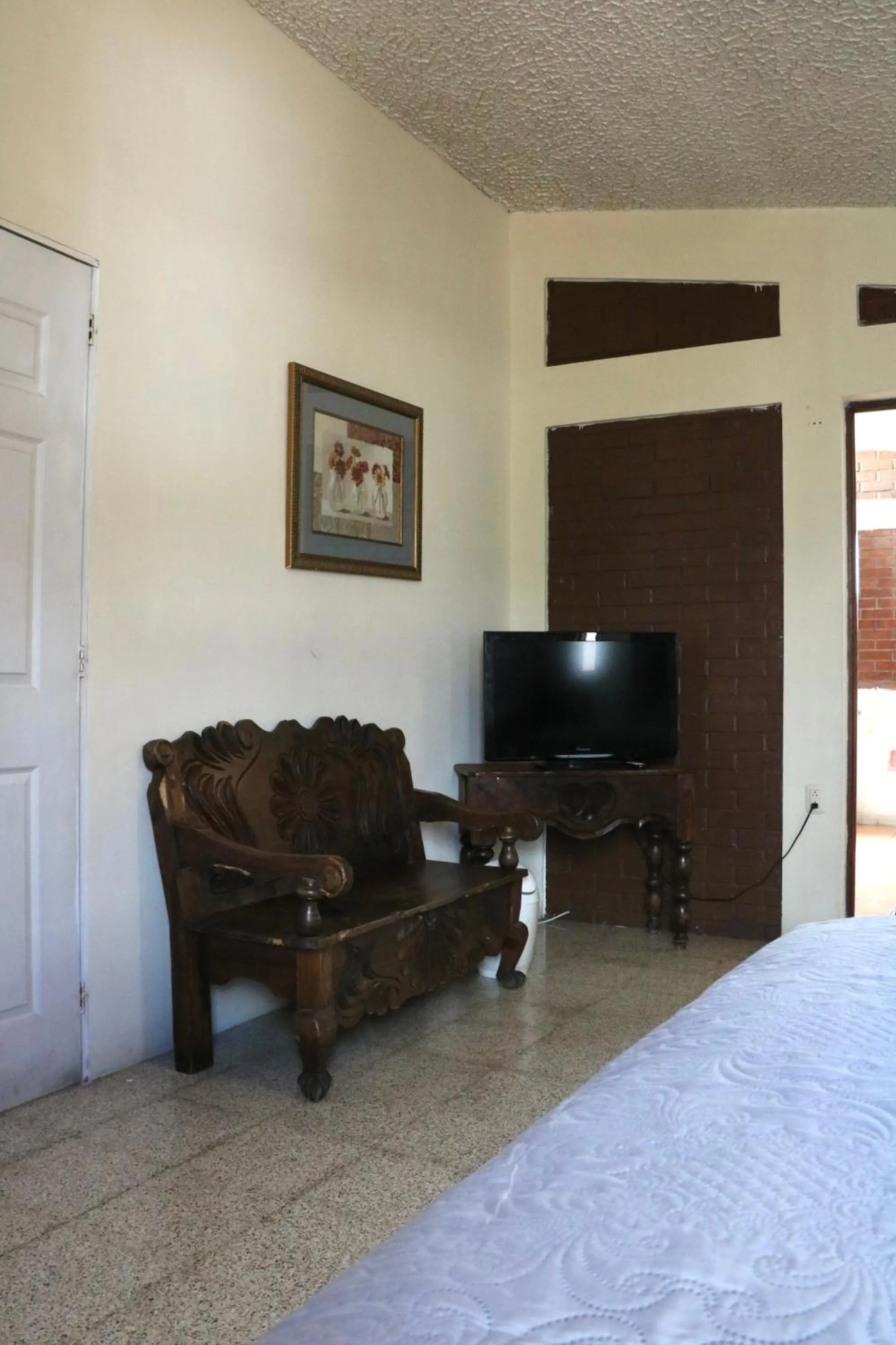 Bed in Hostal Los Volcanes