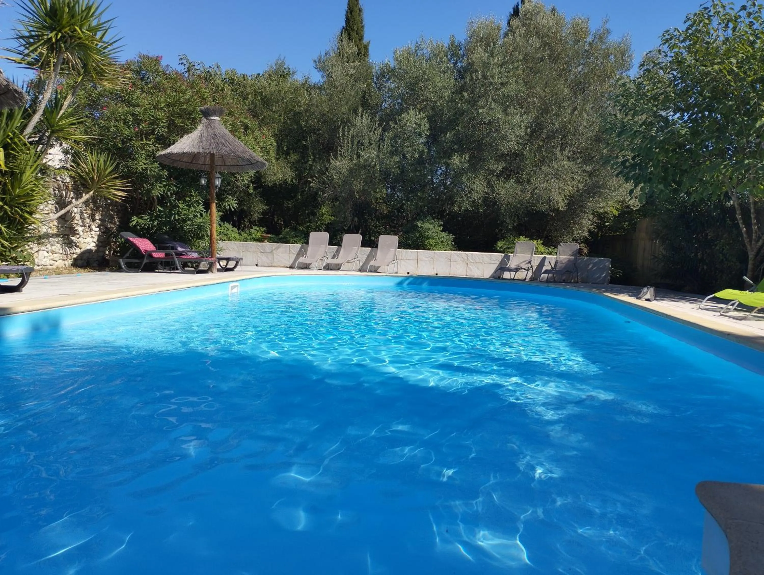 Swimming pool in Logis Hotel Restaurant L'Esquielle