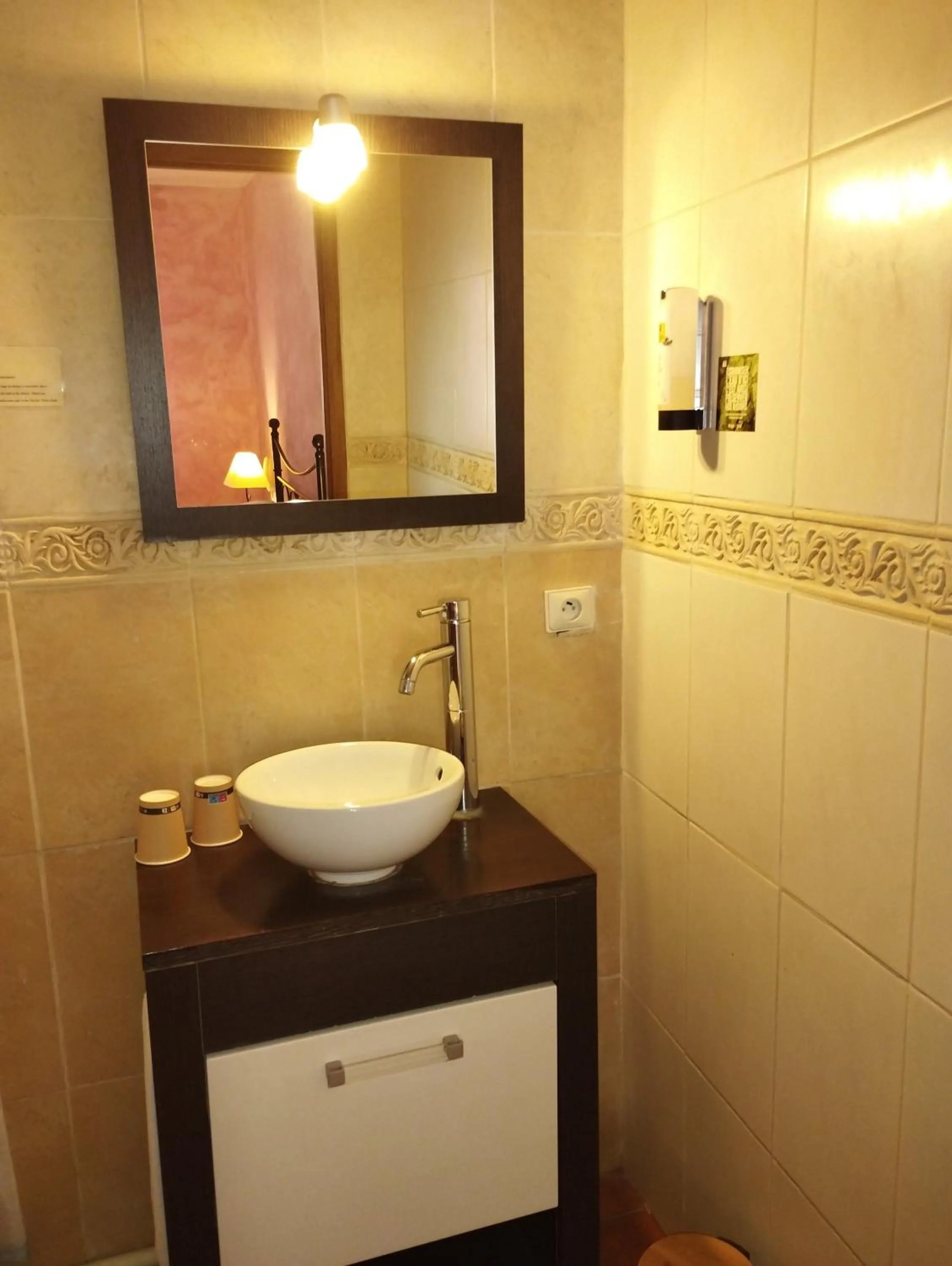 Bathroom in Logis Hotel Restaurant L'Esquielle