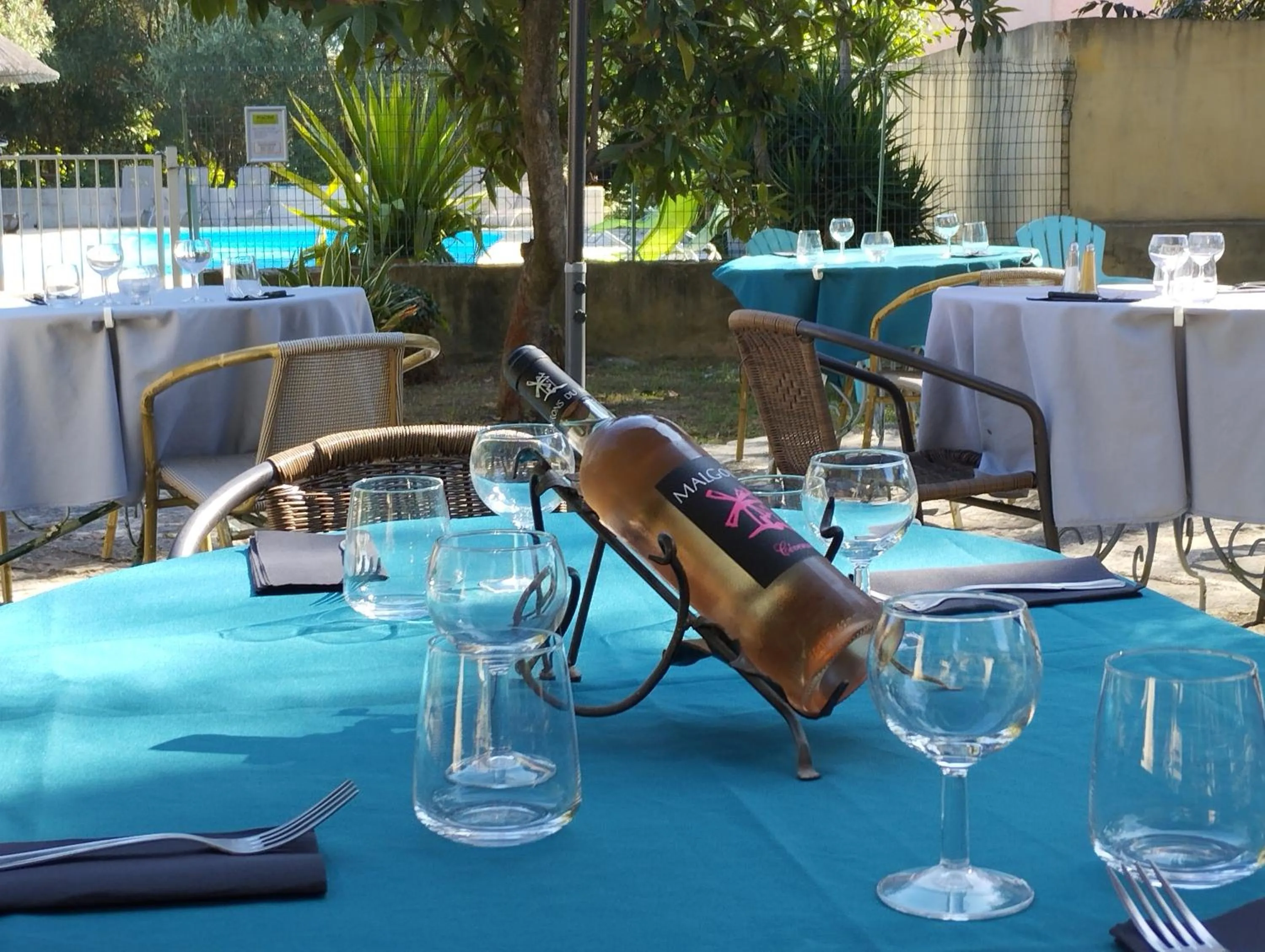 Patio in Logis Hotel Restaurant L'Esquielle
