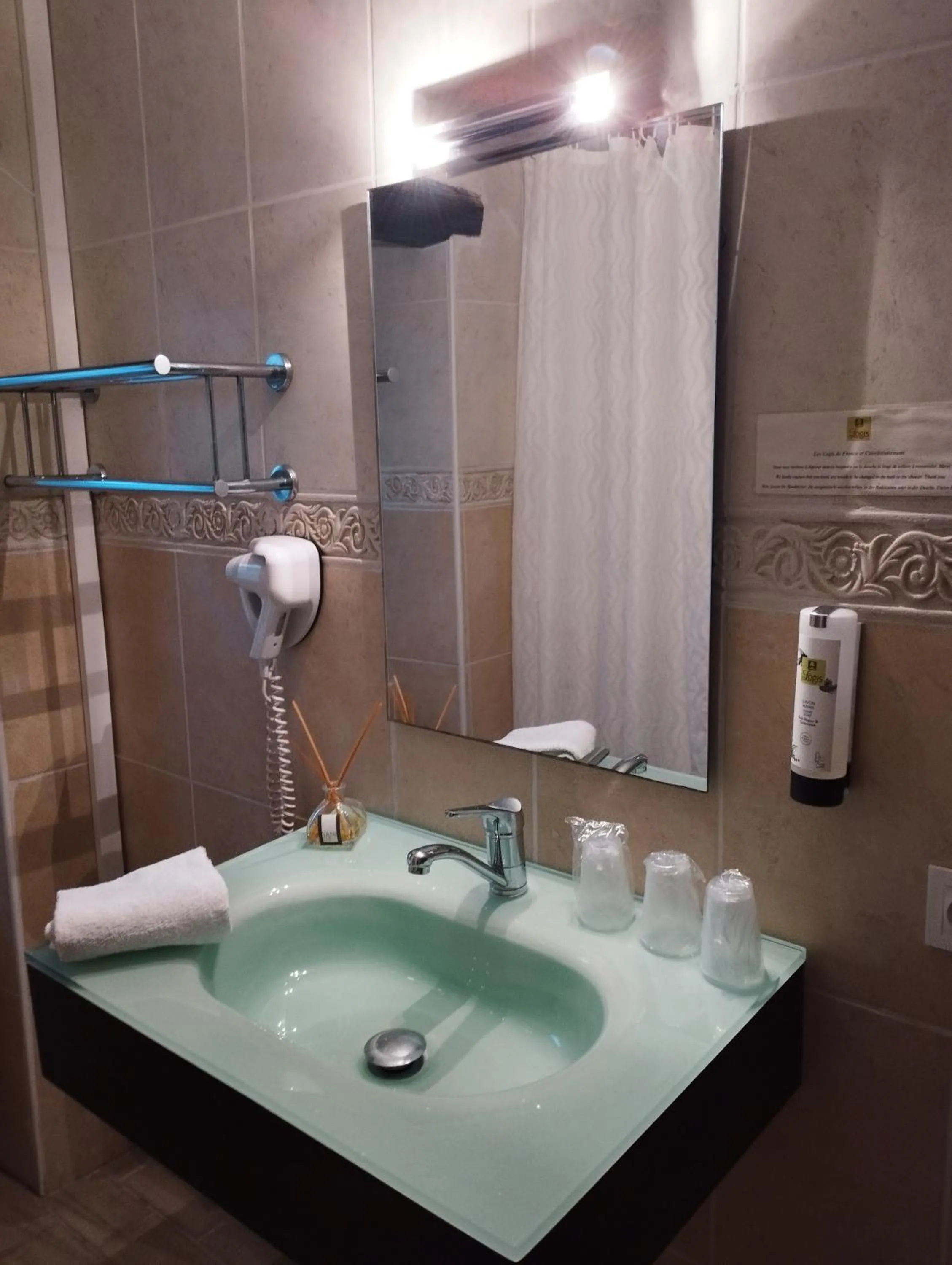 Bathroom in Logis Hotel Restaurant L'Esquielle