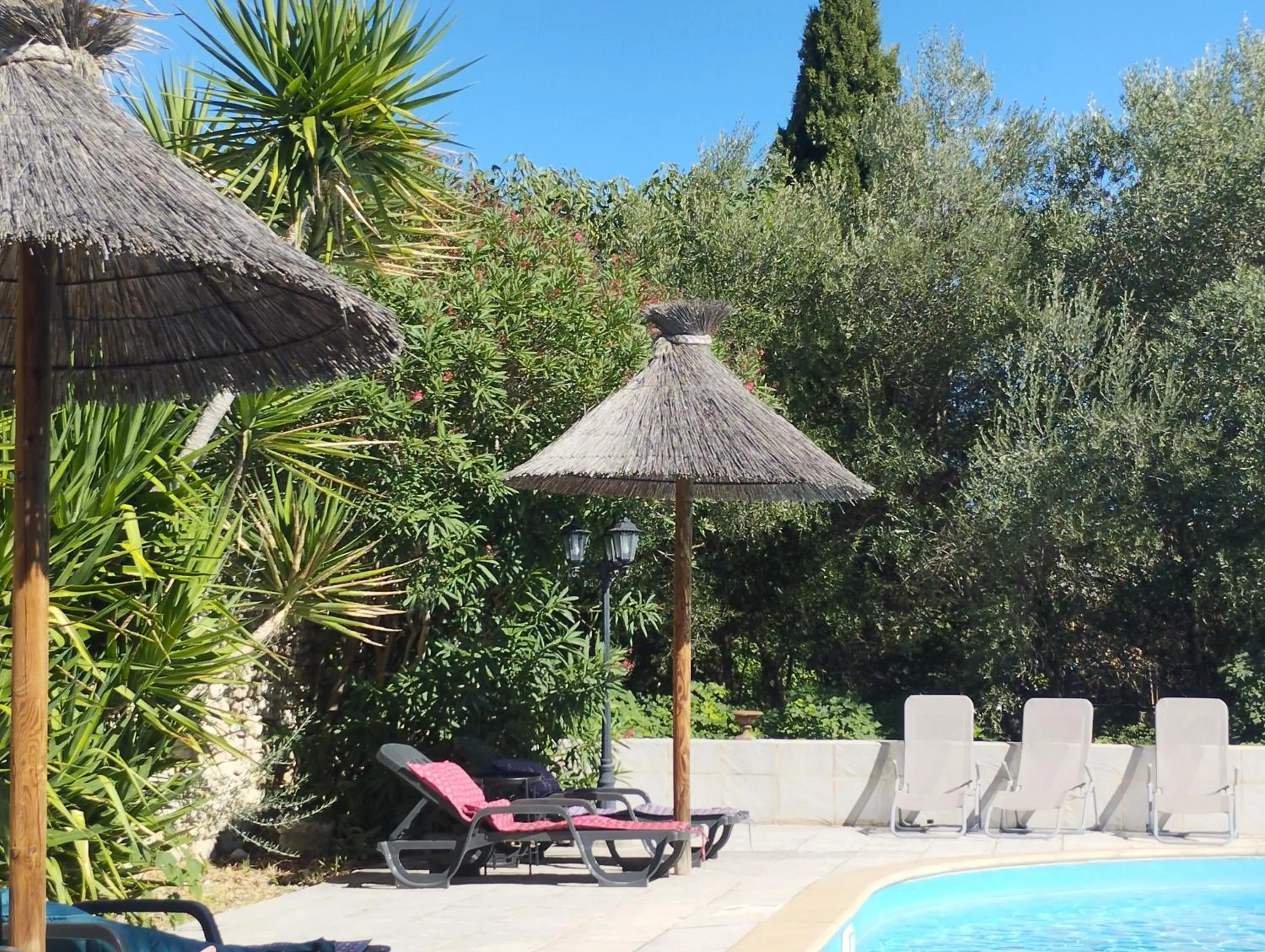 Swimming pool in Logis Hotel Restaurant L'Esquielle