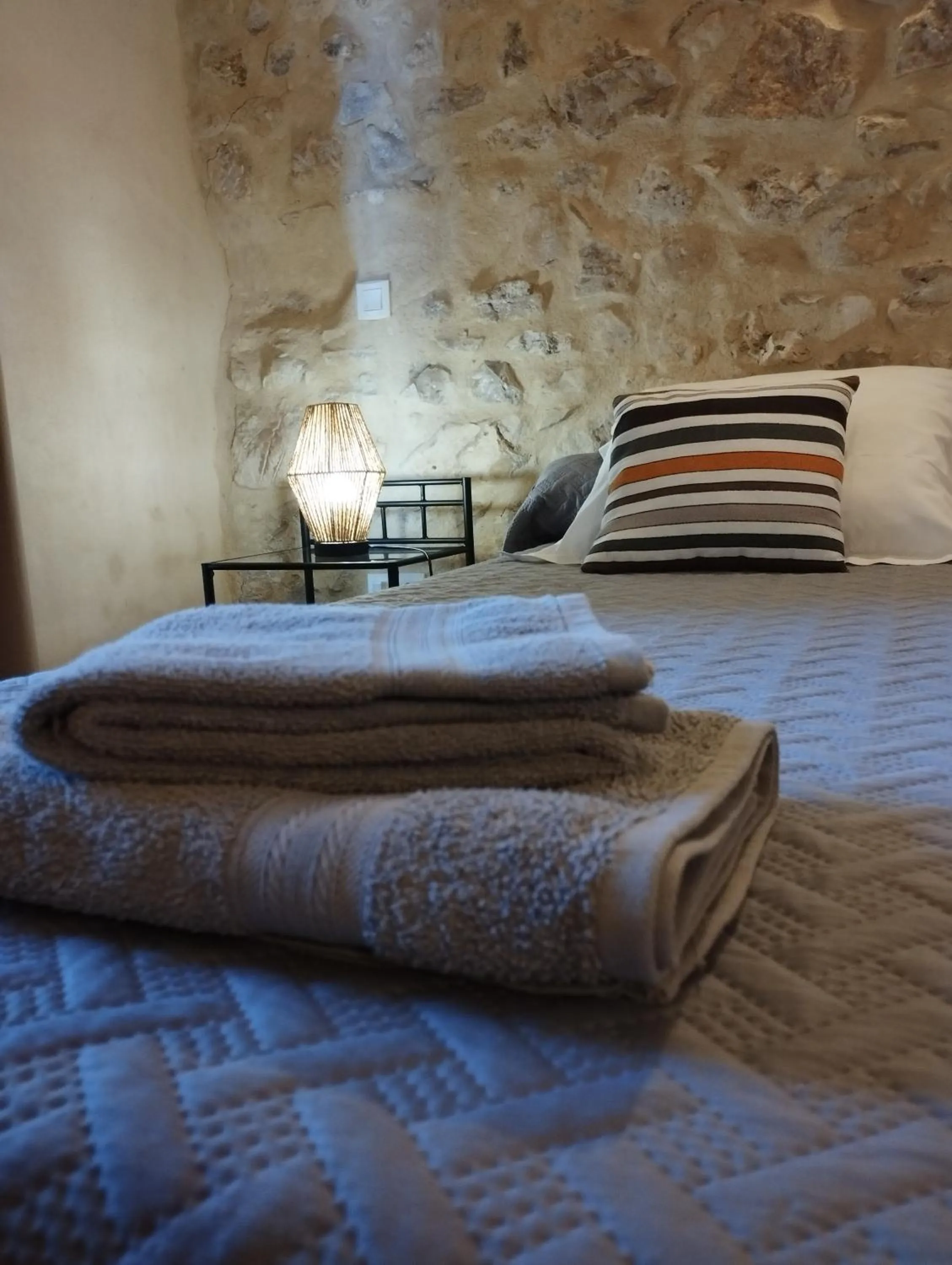 Bed in Logis Hotel Restaurant L'Esquielle