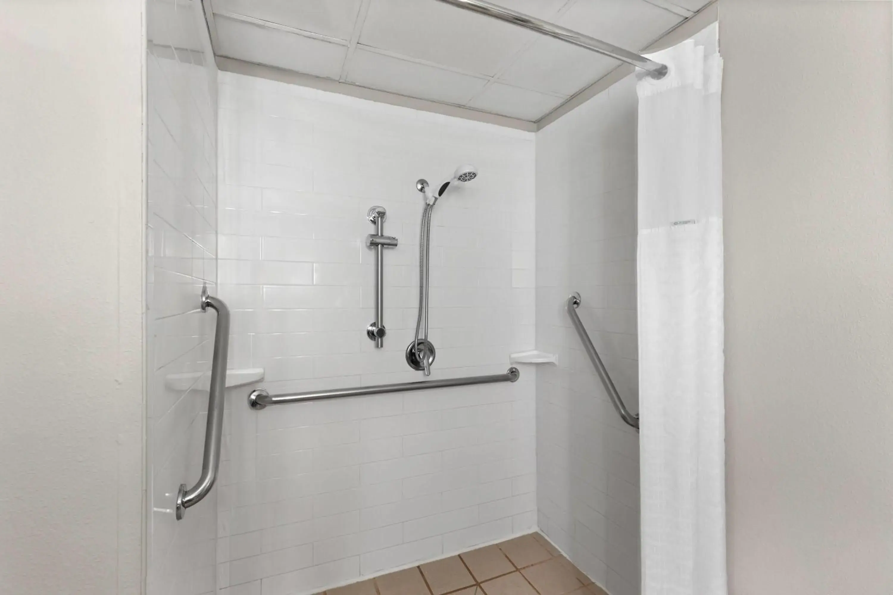 King Suite with Mobility Access and Roll-In Shower, Non-Smoking in Wingate by Wyndham Greensboro-Coliseum King Suite with Mobility Access and Roll-In Shower, Non-Smoking in Wingate by Wyndham Greensboro-Coliseum