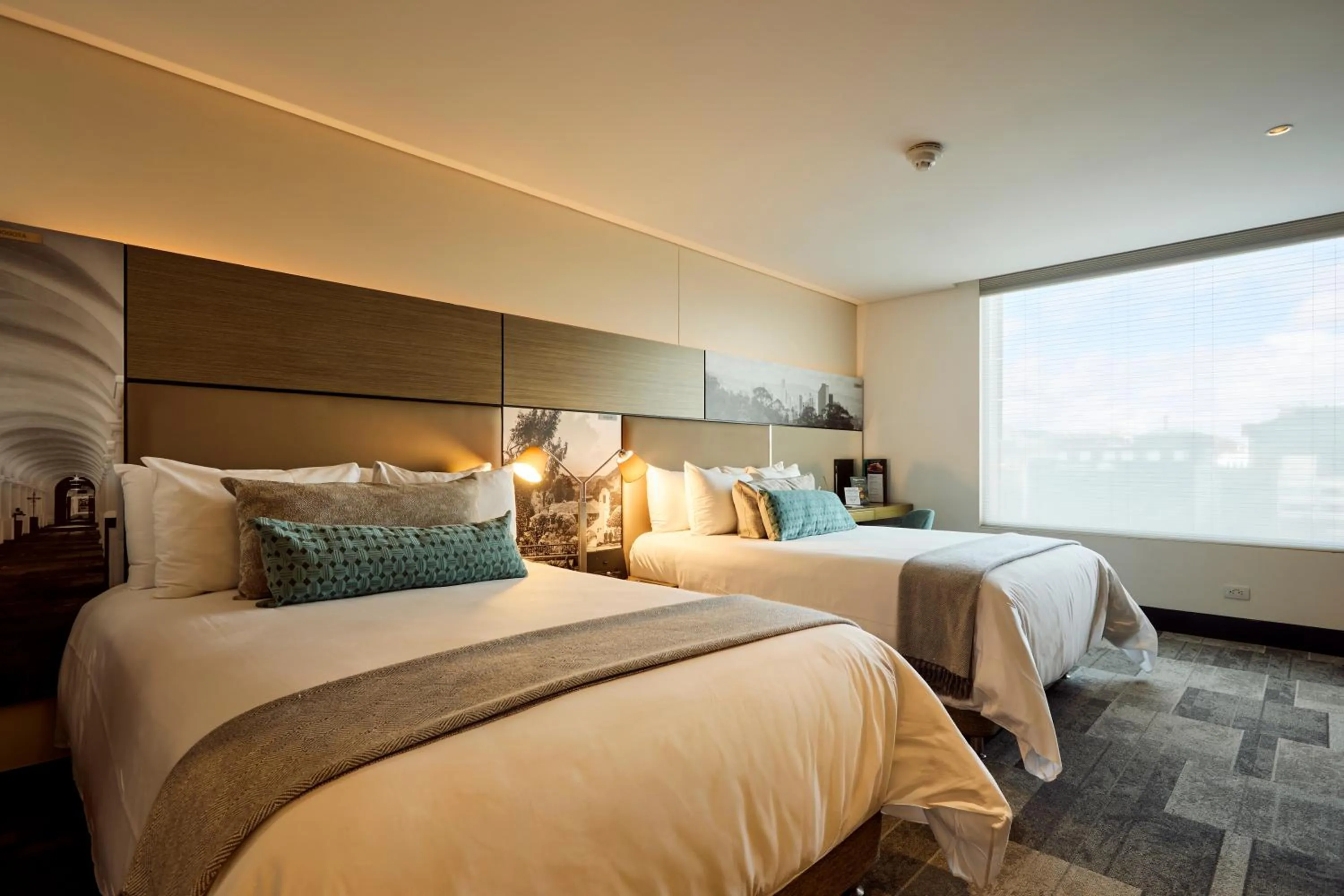 Bed in EK Hotel By Preferred Hotels Group
