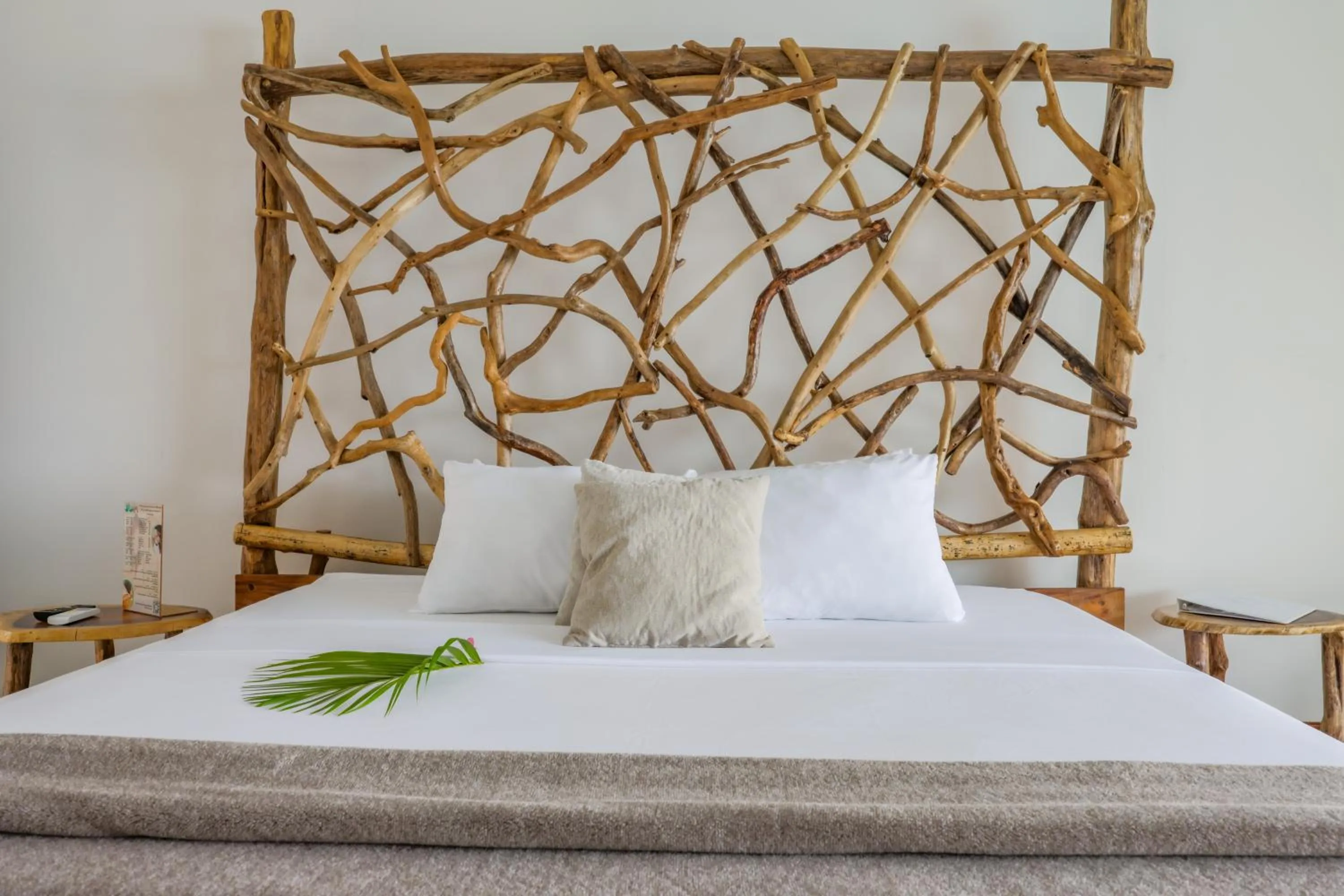 Bed in Akua Suites Ocean View