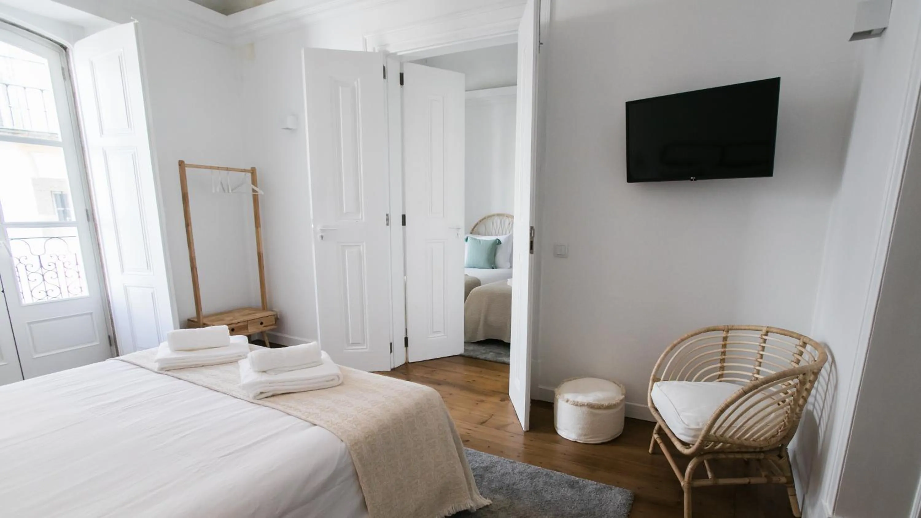 Bed in Casa Soure Suites and Apartments