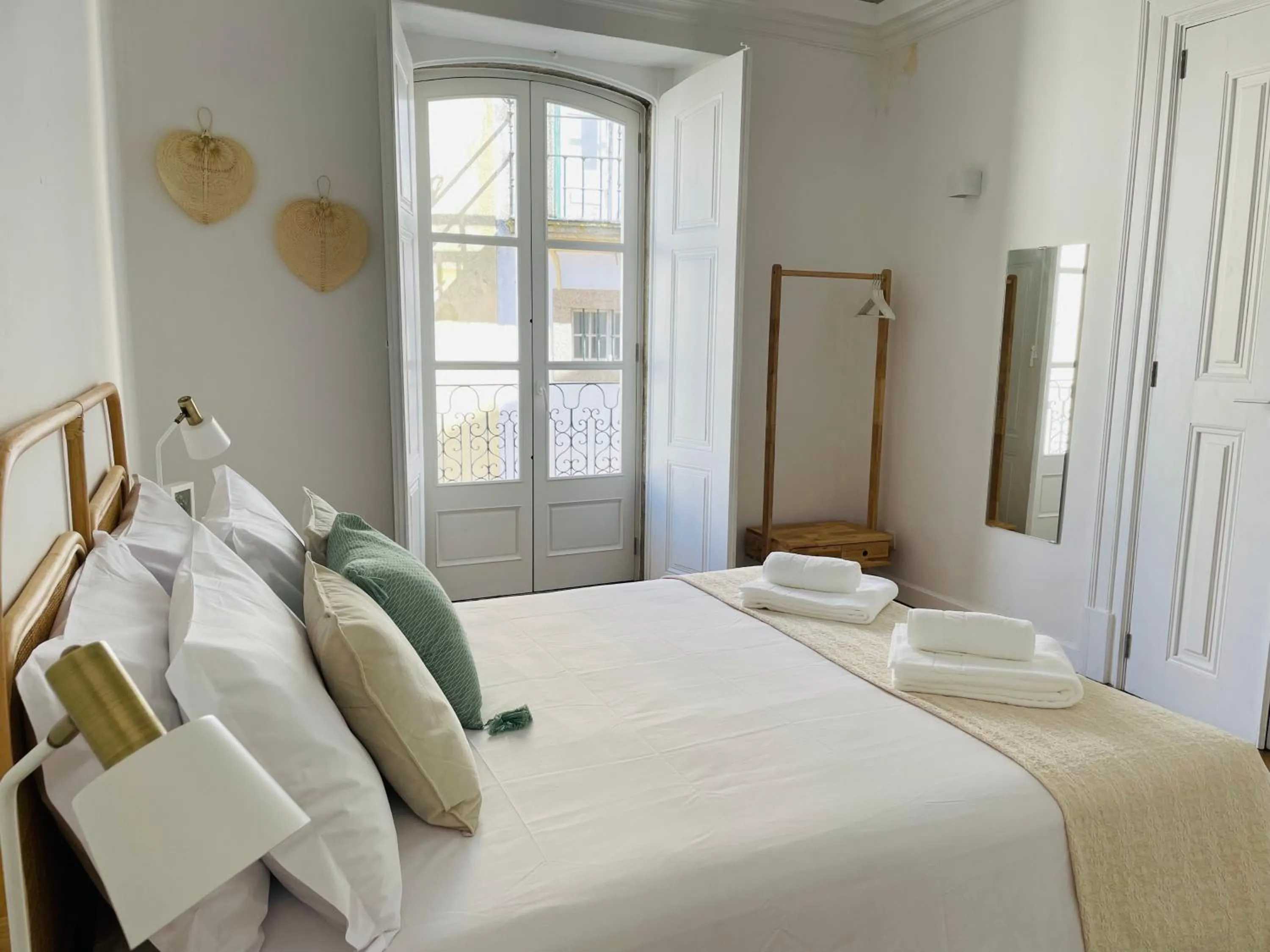 Bed in Casa Soure Suites and Apartments