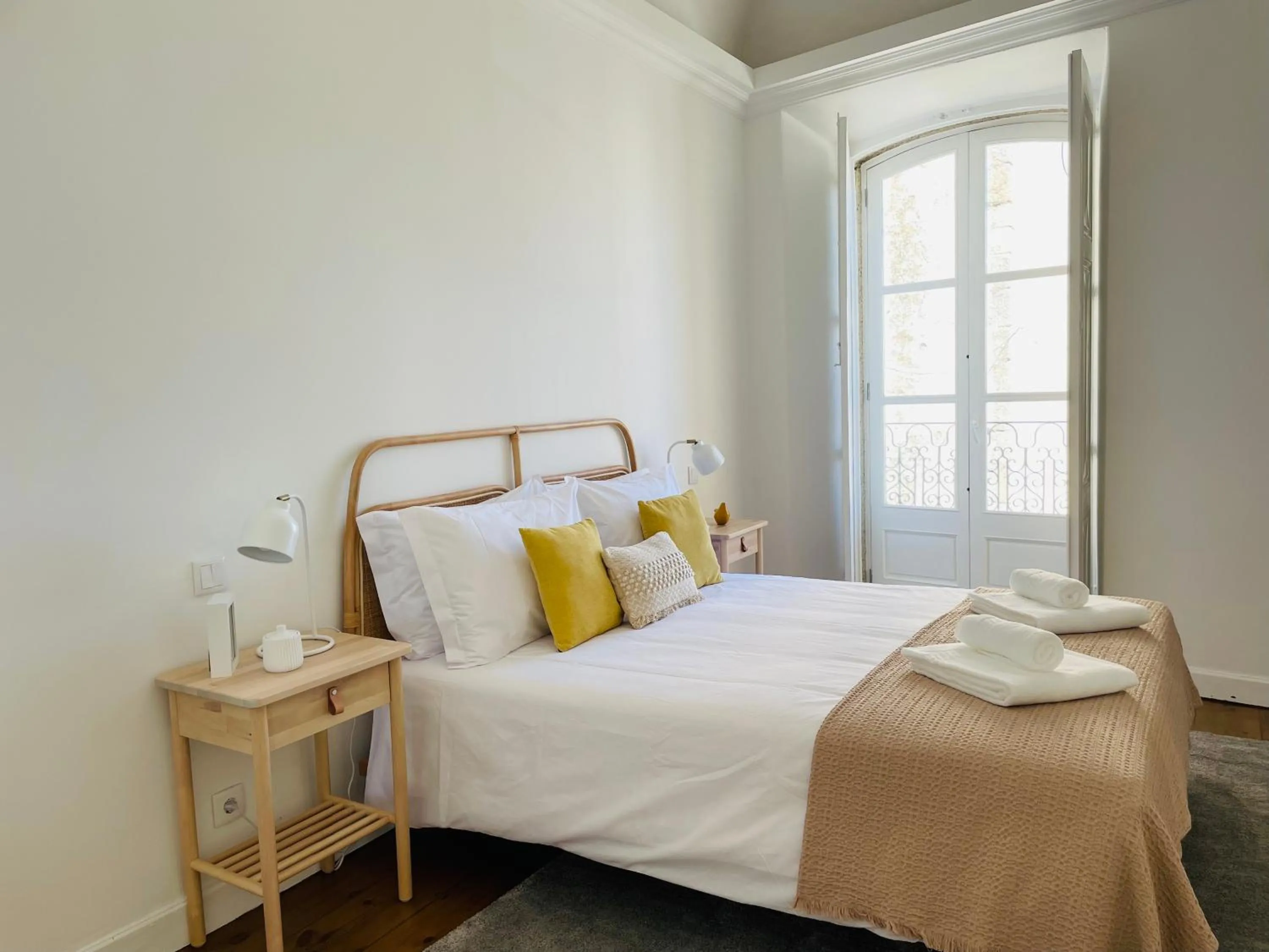 Bed in Casa Soure Suites and Apartments