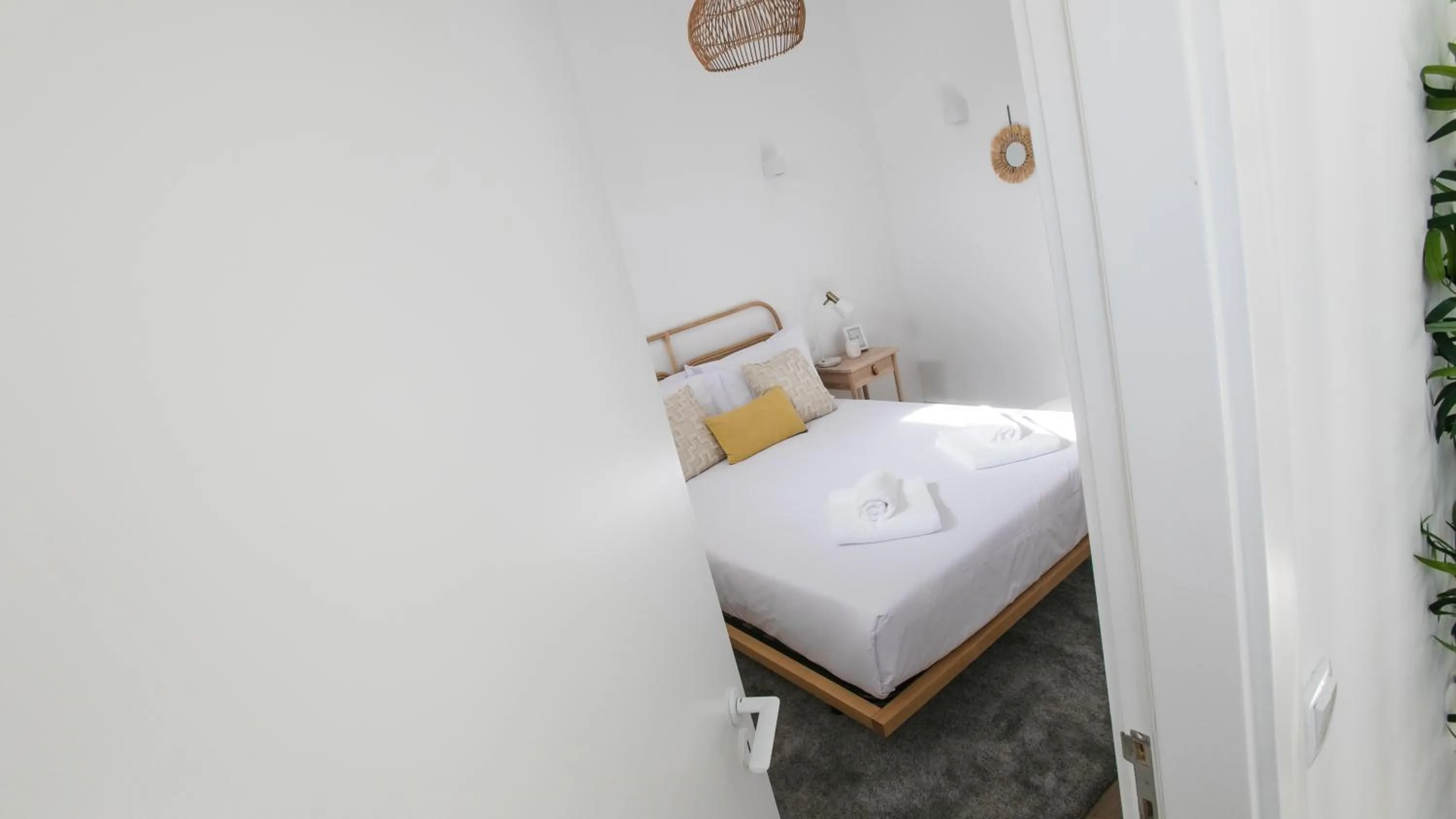 Bed in Casa Soure Suites and Apartments