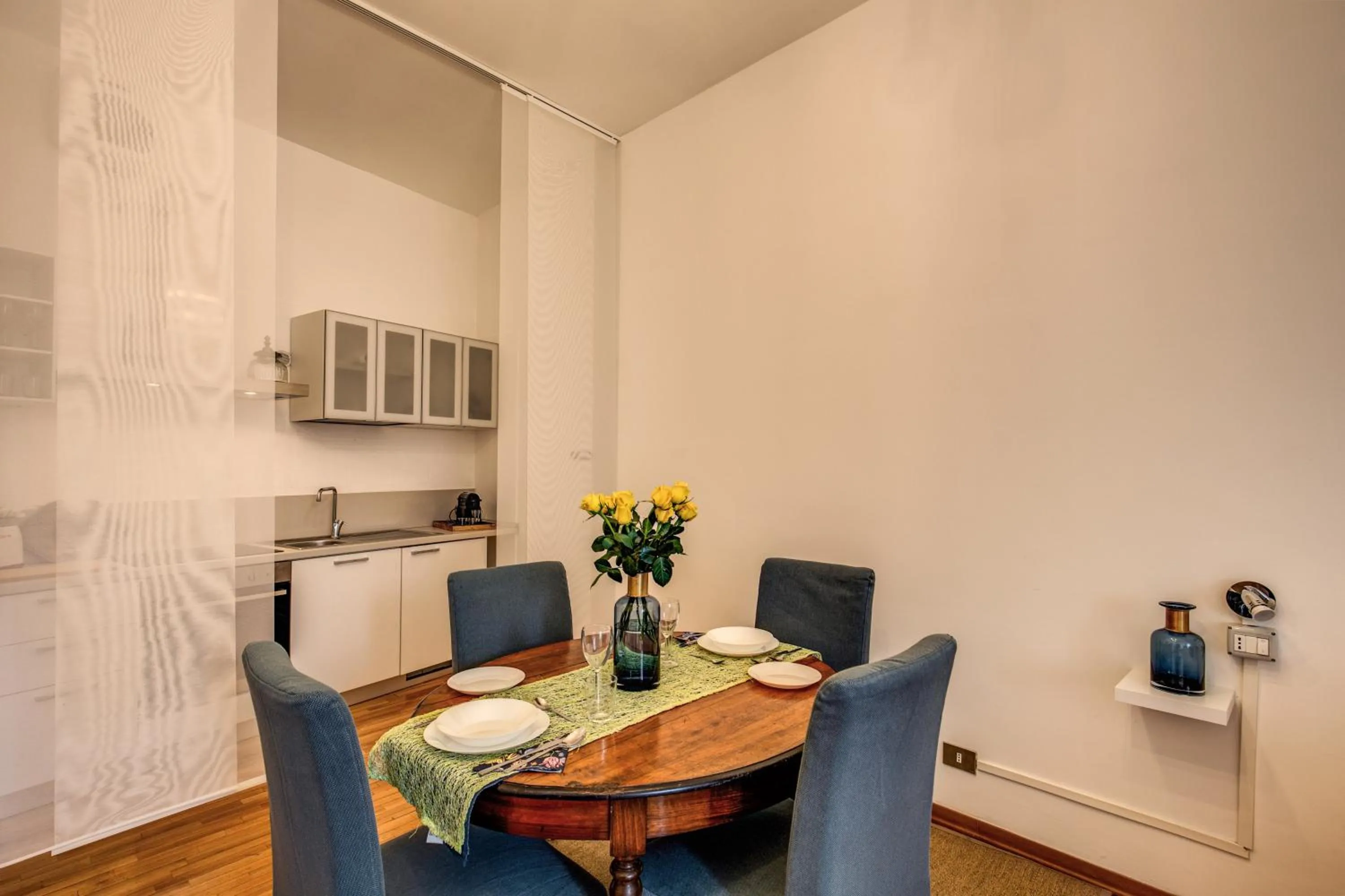 Dining area in Elegant Apartment Behind the Colosseum