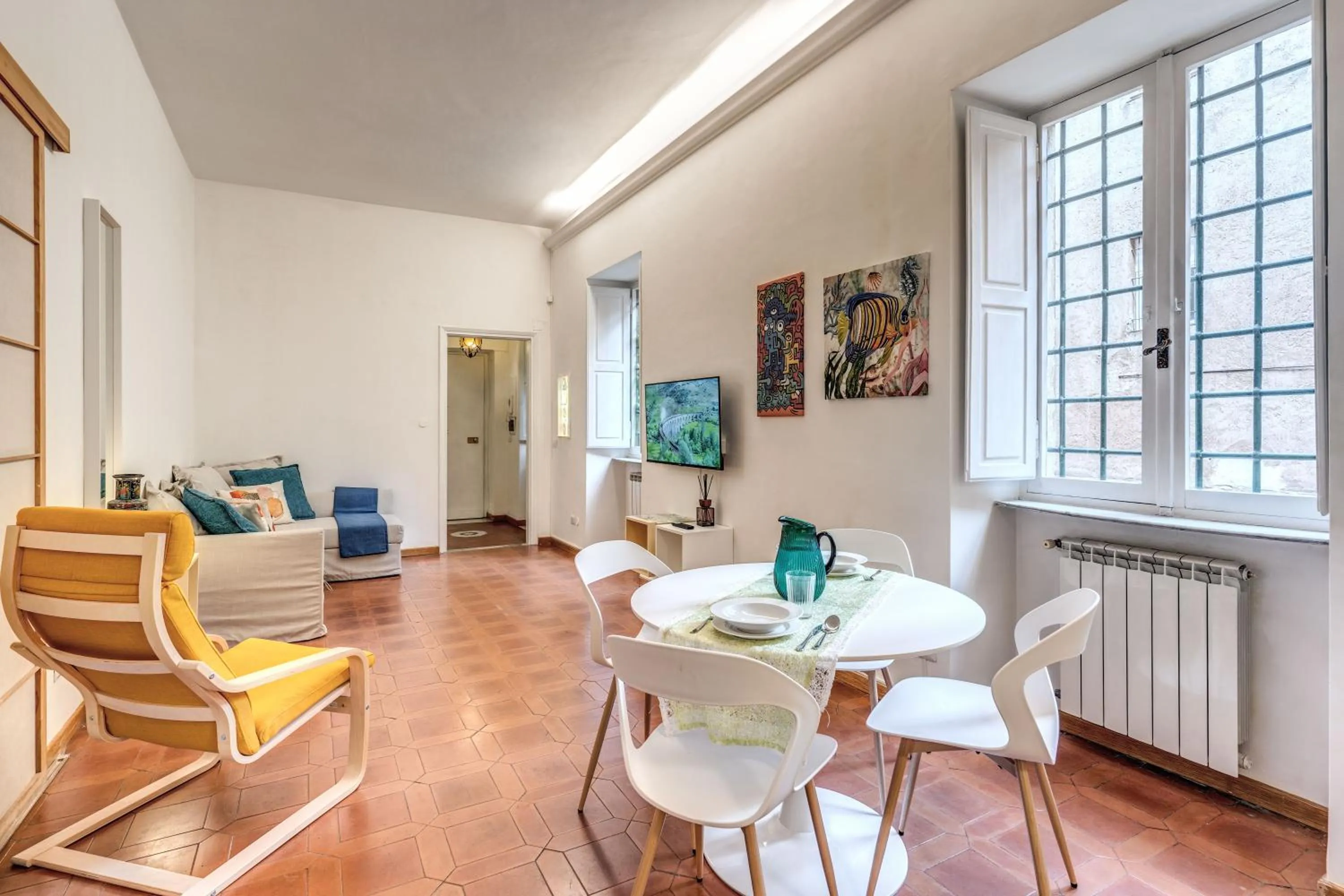 Seating area in Elegant Apartment Behind the Colosseum