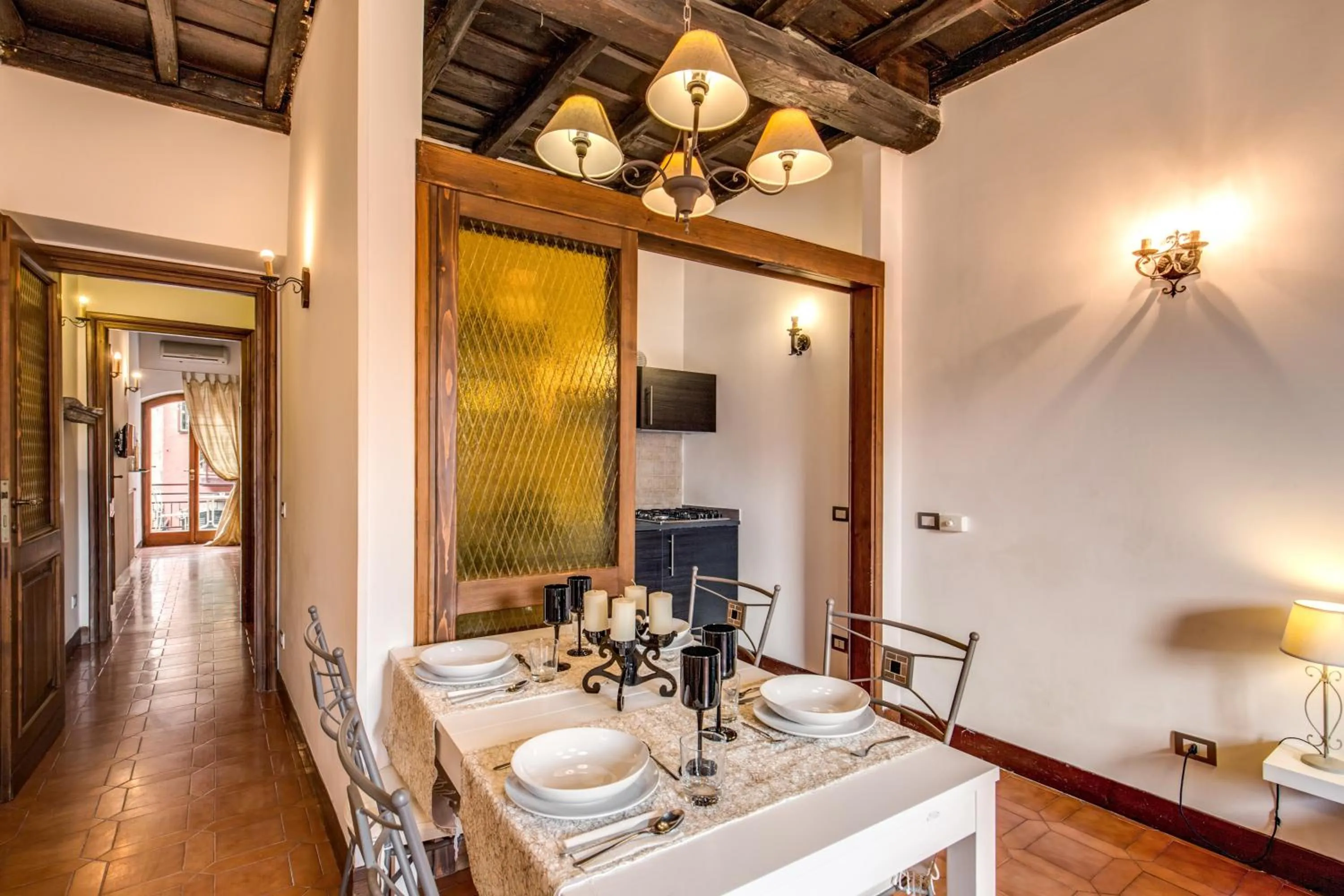 Dining area in Elegant Apartment Behind the Colosseum
