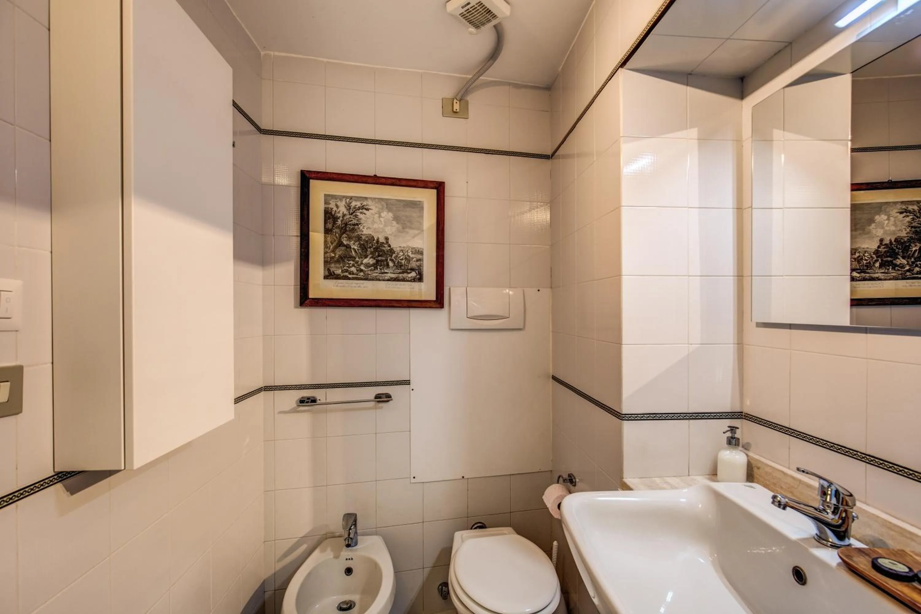 Toilet in Elegant Apartment Behind the Colosseum