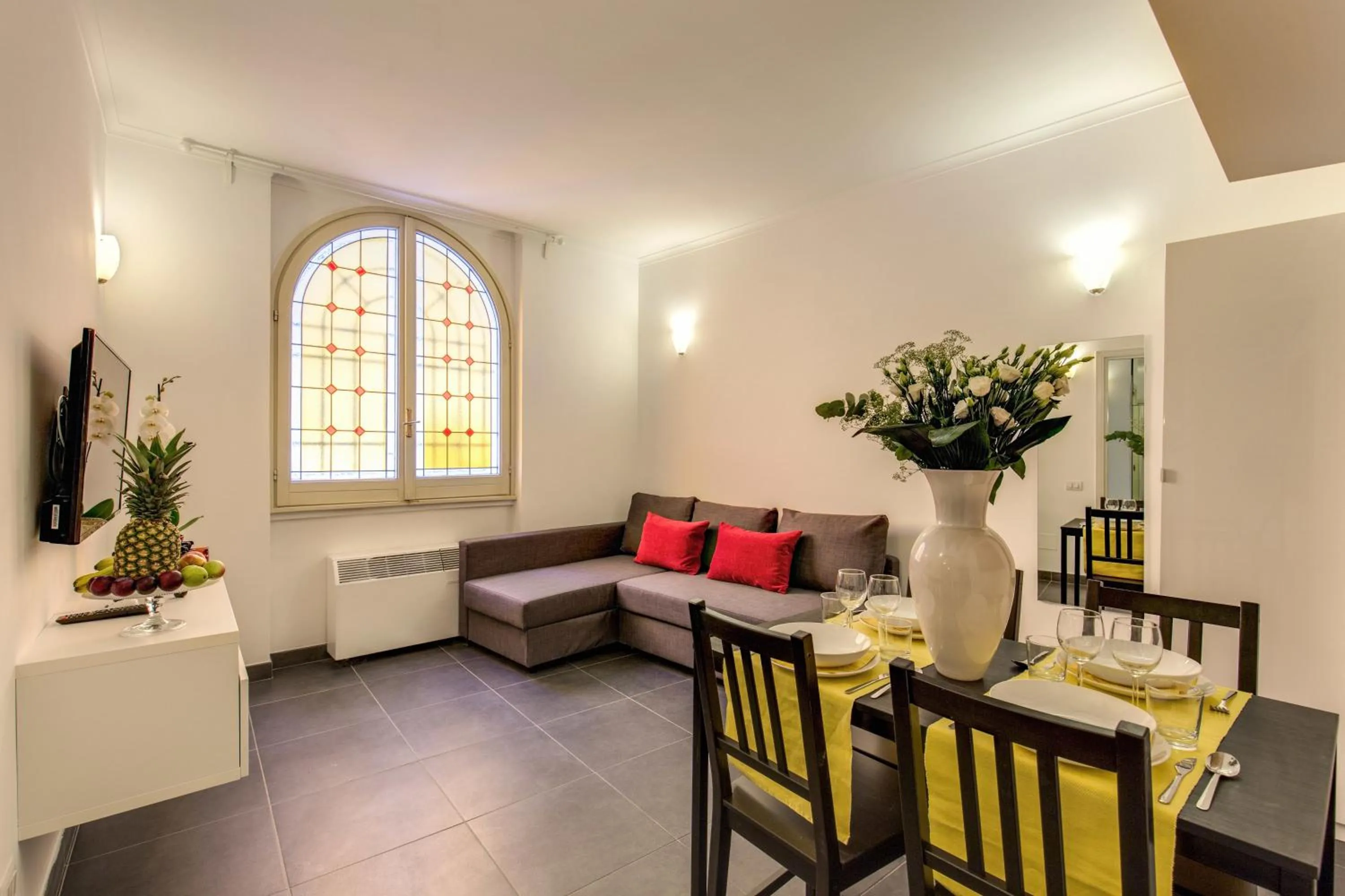 Dining area in Elegant Apartment Behind the Colosseum