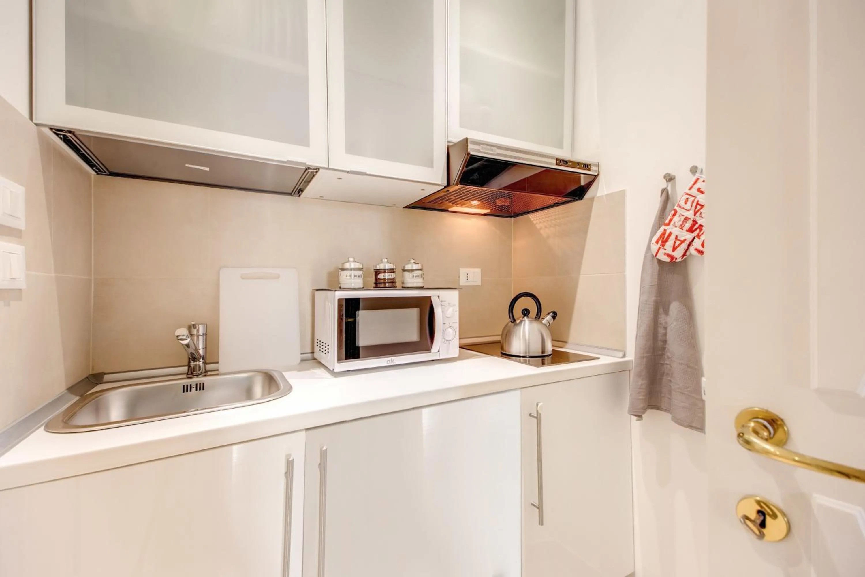 Kitchen or kitchenette in Elegant Apartment Behind the Colosseum