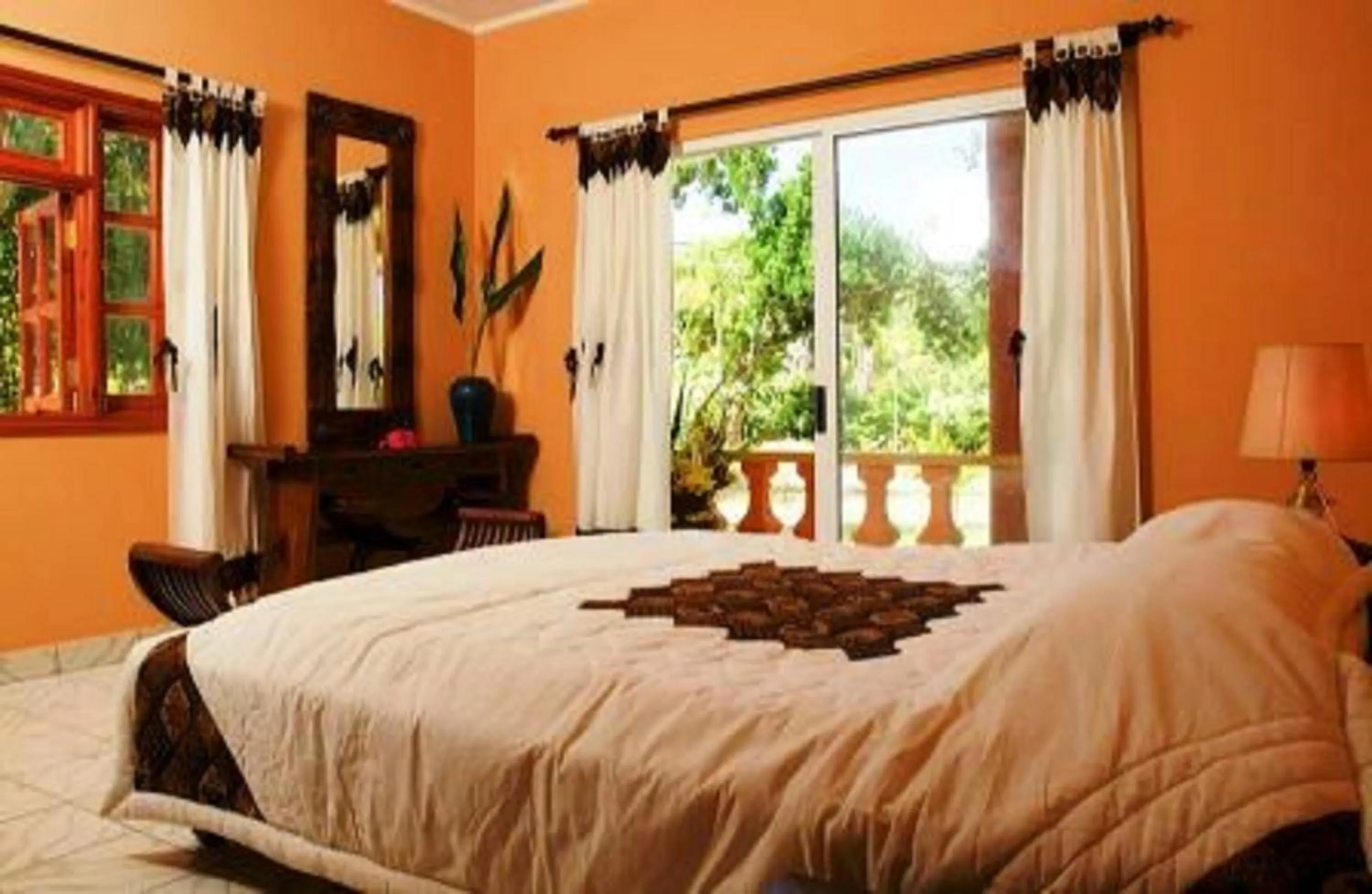 Bedroom, Bed in Villas des Alizes beachfront suites and garden villas