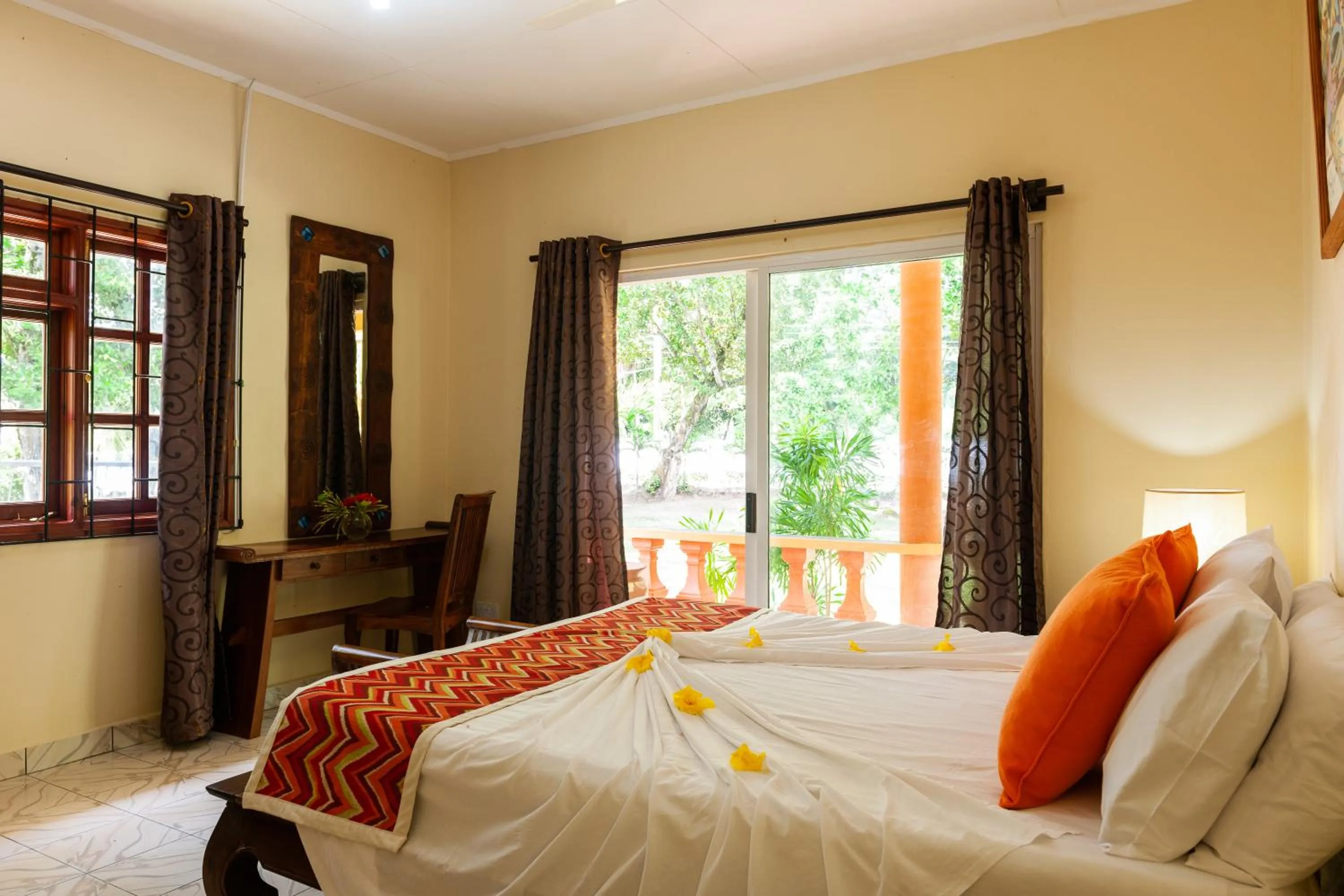 Bed in Villas des Alizes beachfront suites and garden villas