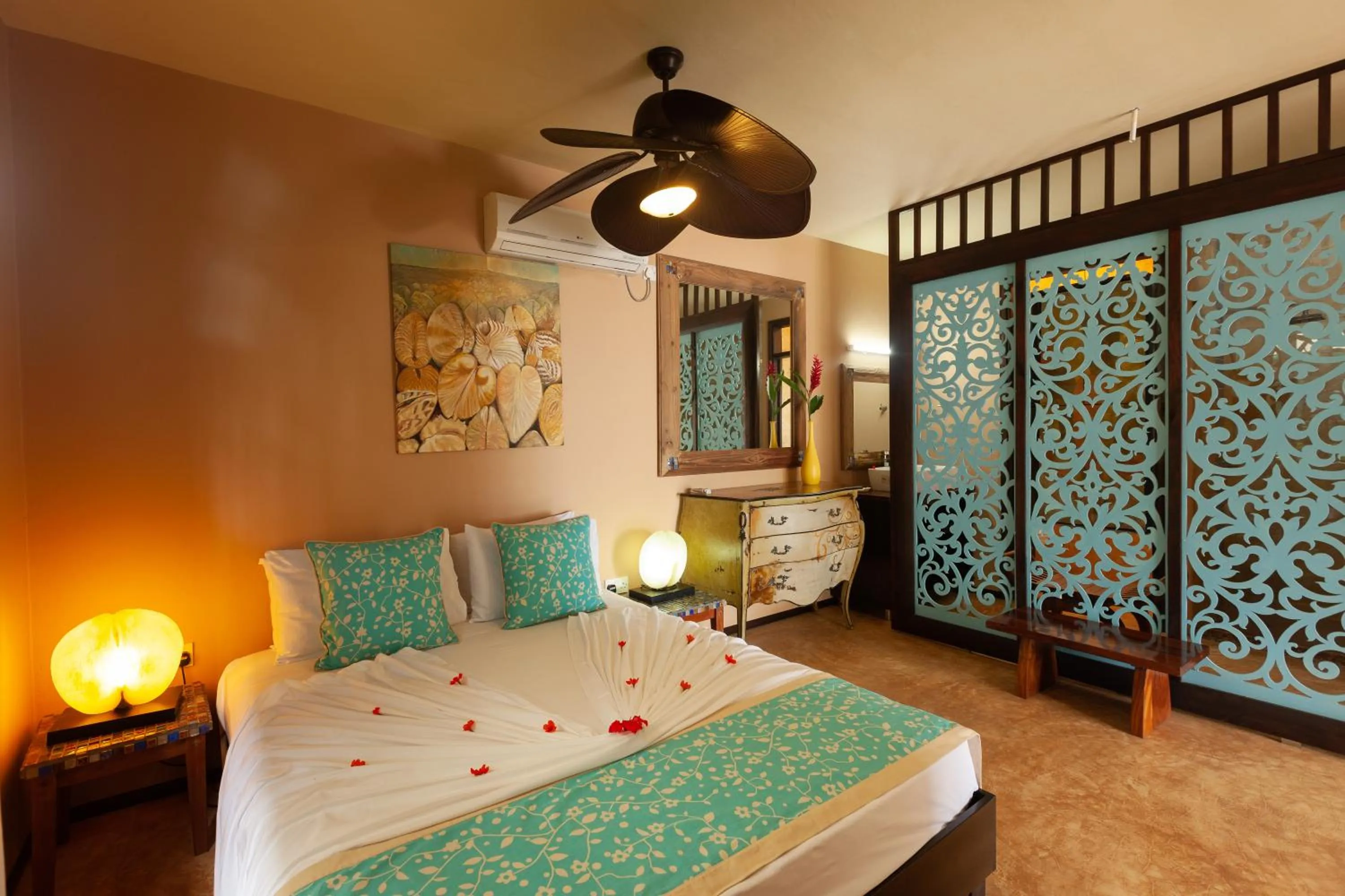 Bed in Villas des Alizes beachfront suites and garden villas