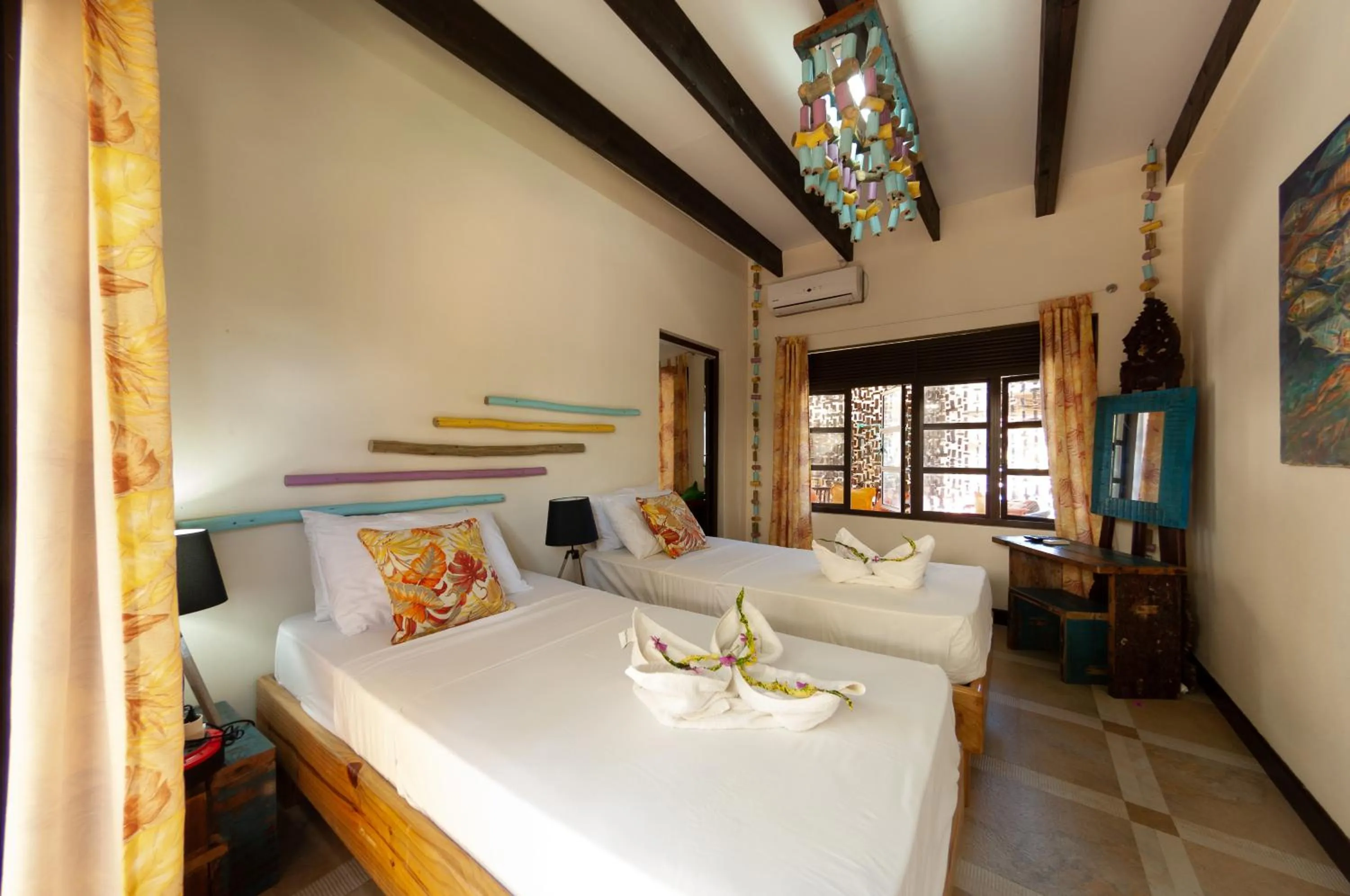 Bed in Villas des Alizes beachfront suites and garden villas