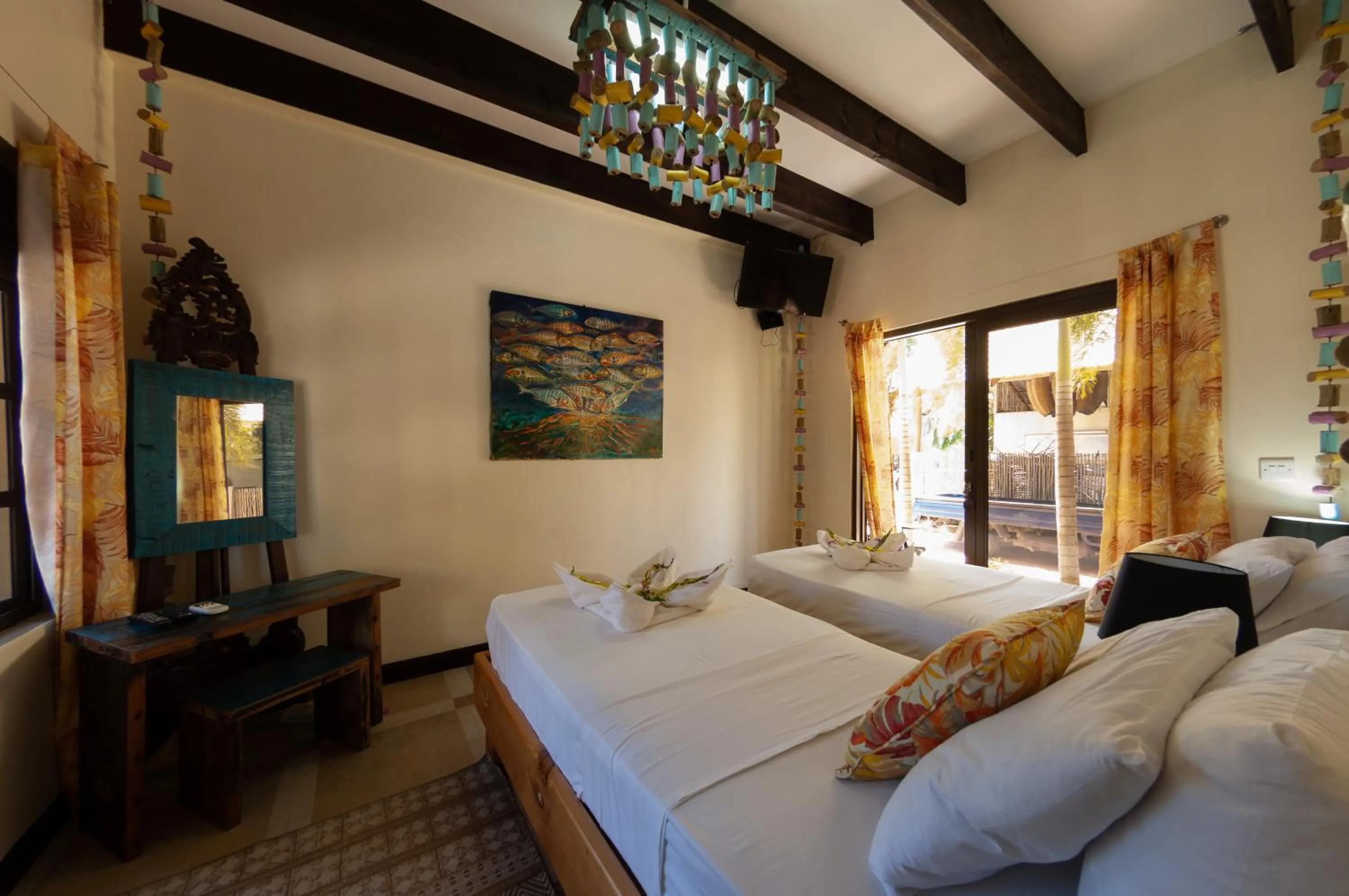 Bed in Villas des Alizes beachfront suites and garden villas