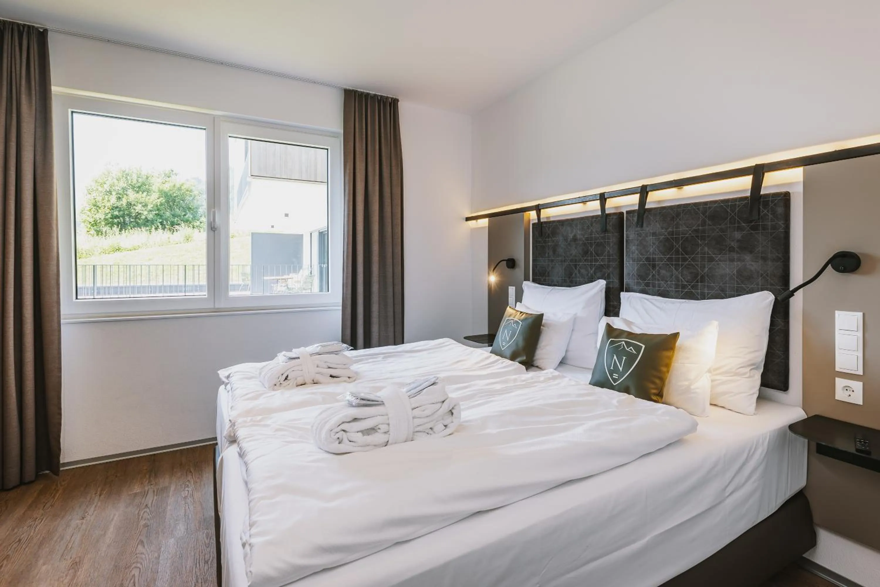 Bedroom, Bed in Nikolaus by AvenidA Panoramic Wellness Suites