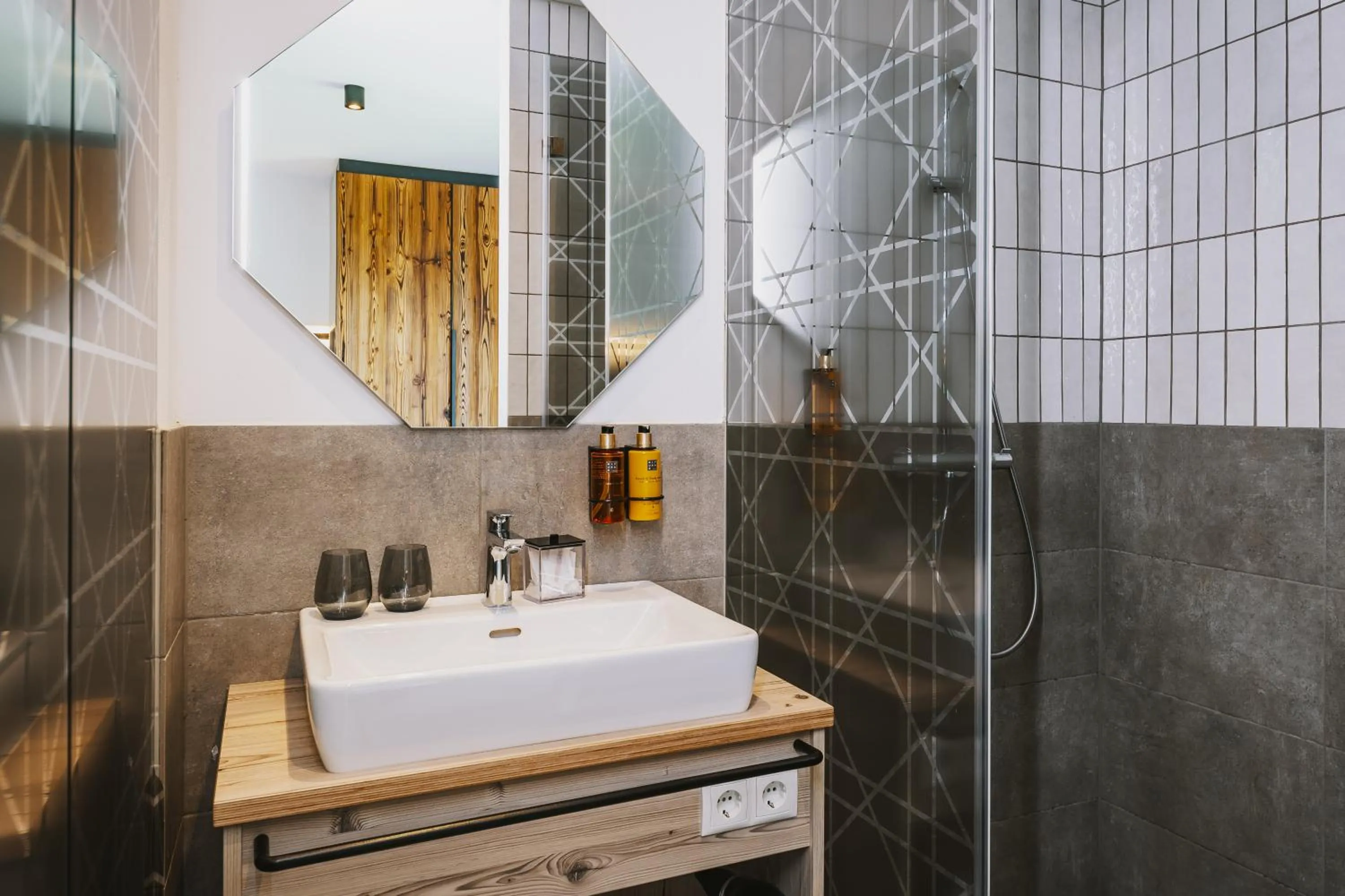 Shower in Nikolaus by AvenidA Panoramic Wellness Suites