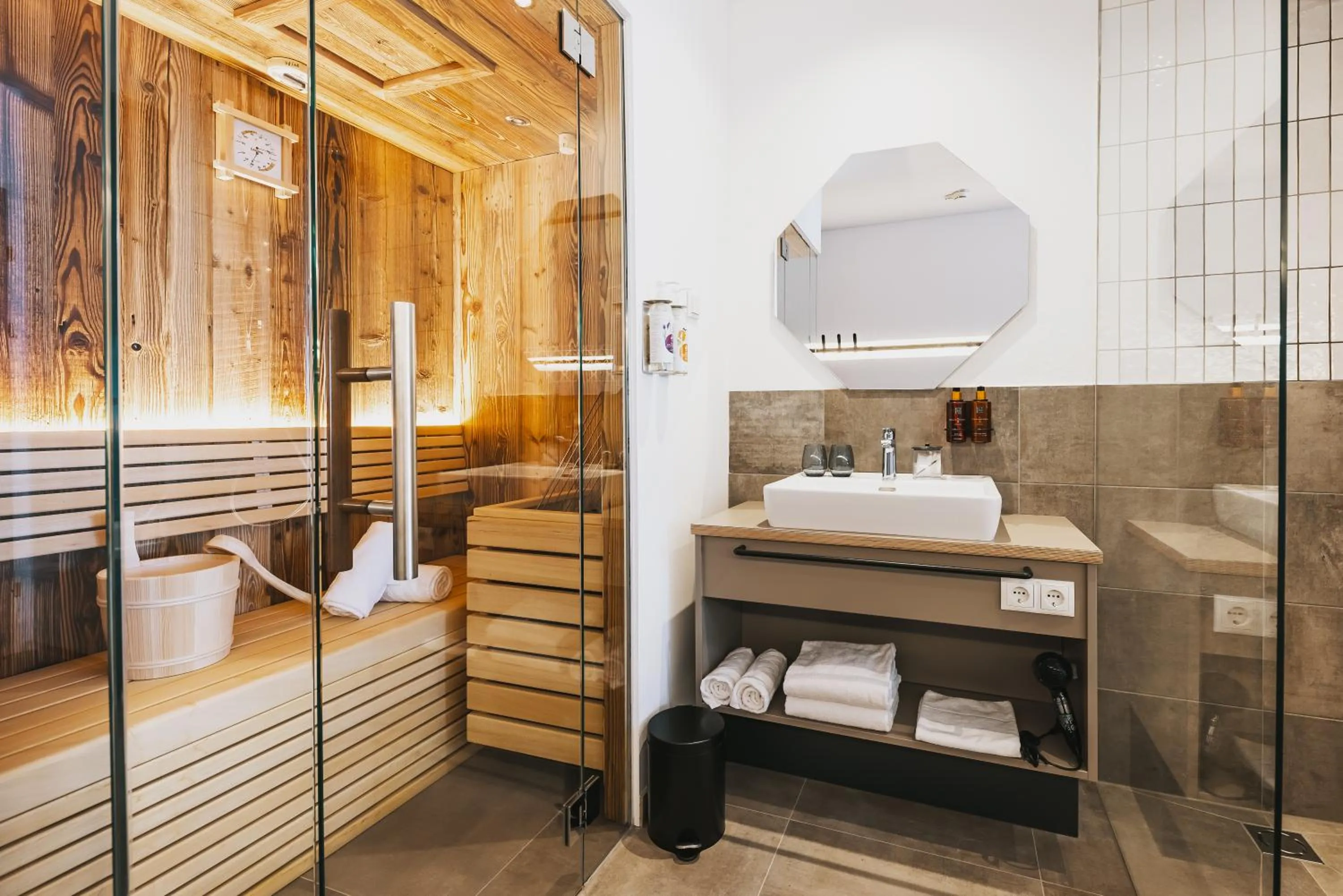 Shower in Nikolaus by AvenidA Panoramic Wellness Suites