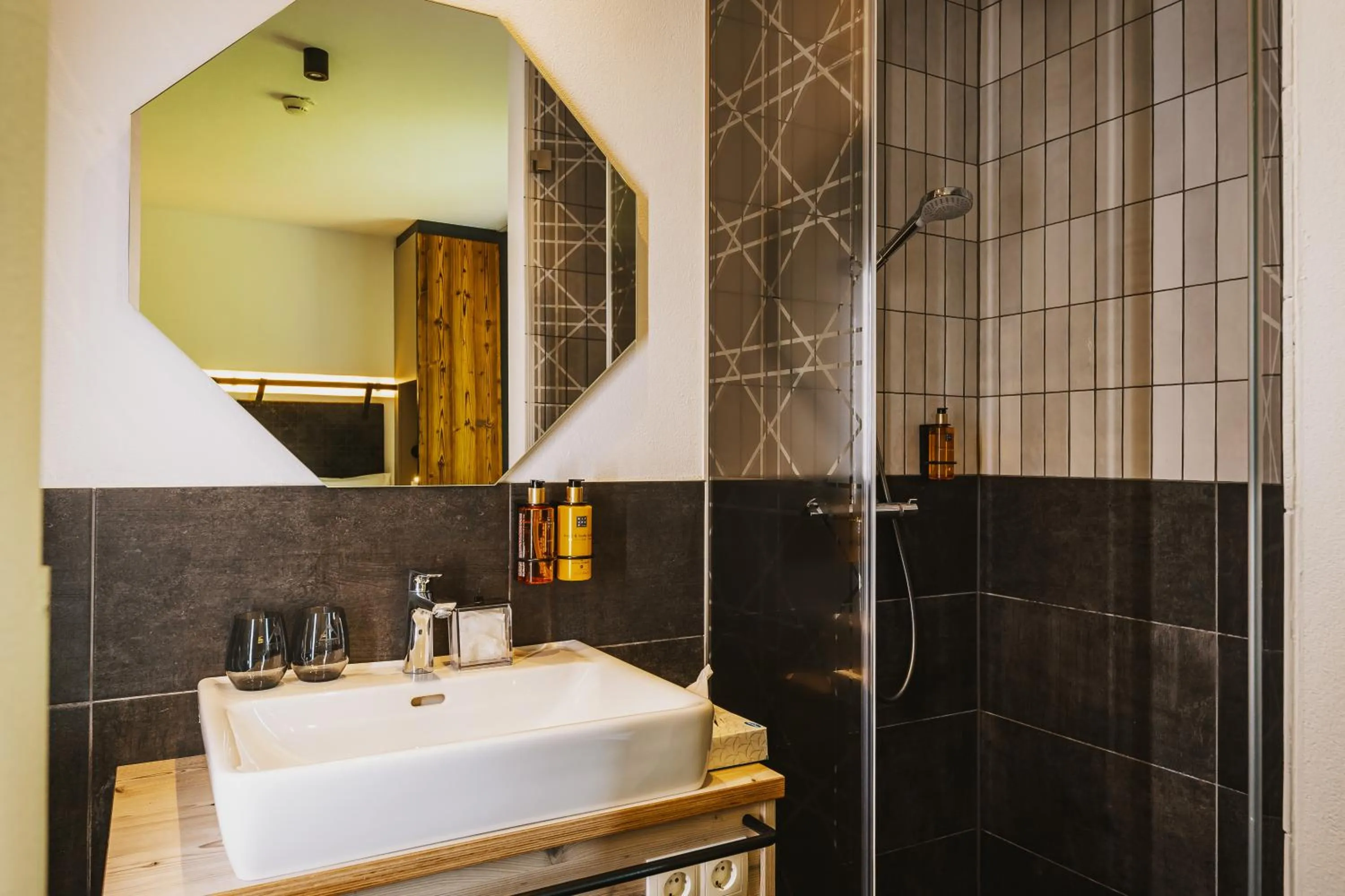 Bathroom in Nikolaus by AvenidA Panoramic Wellness Suites