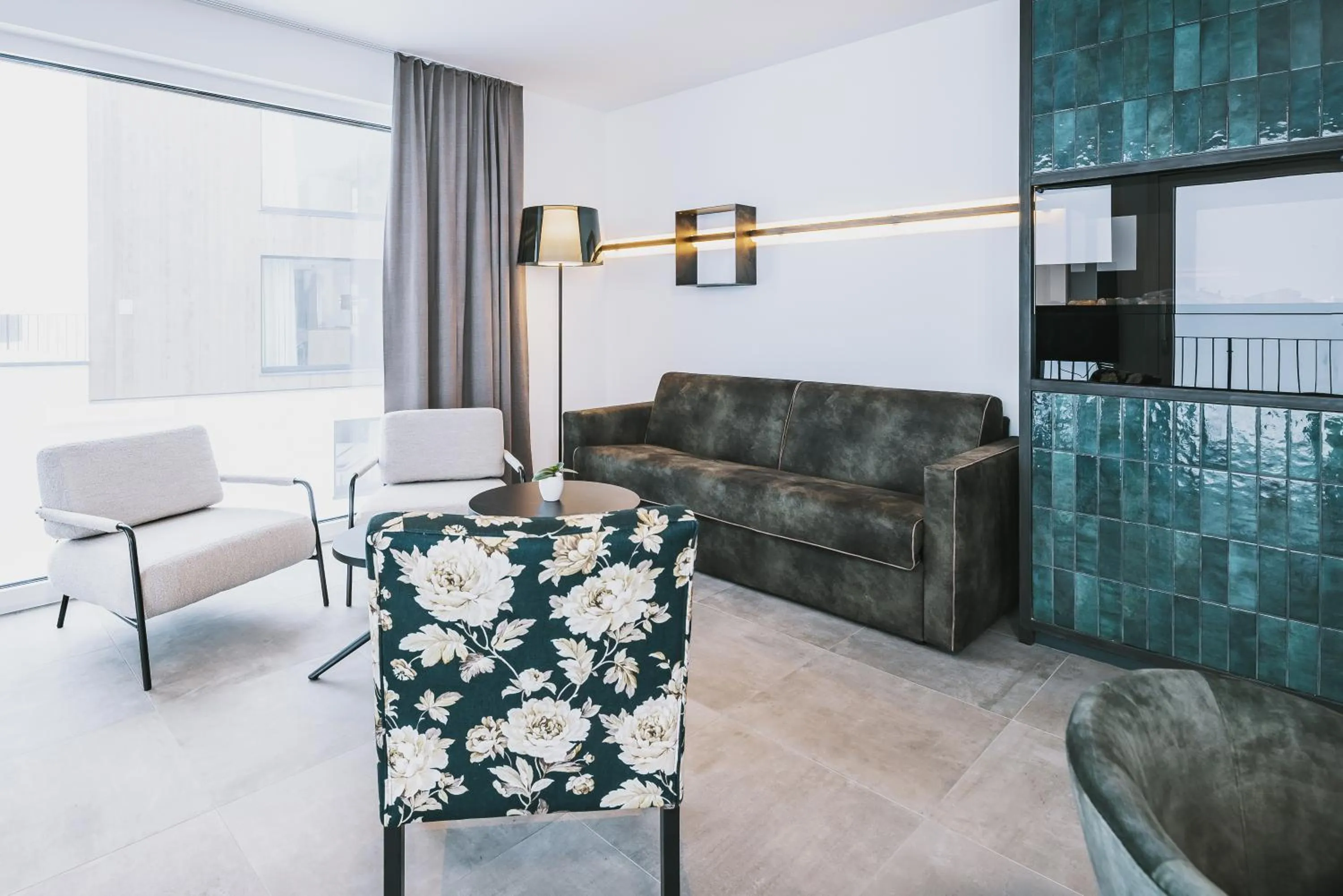 Living room in Nikolaus by AvenidA Panoramic Wellness Suites