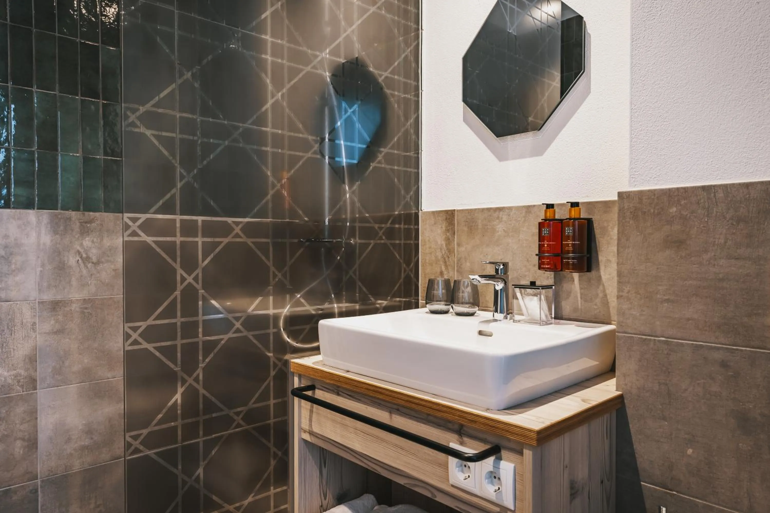 Shower in Nikolaus by AvenidA Panoramic Wellness Suites