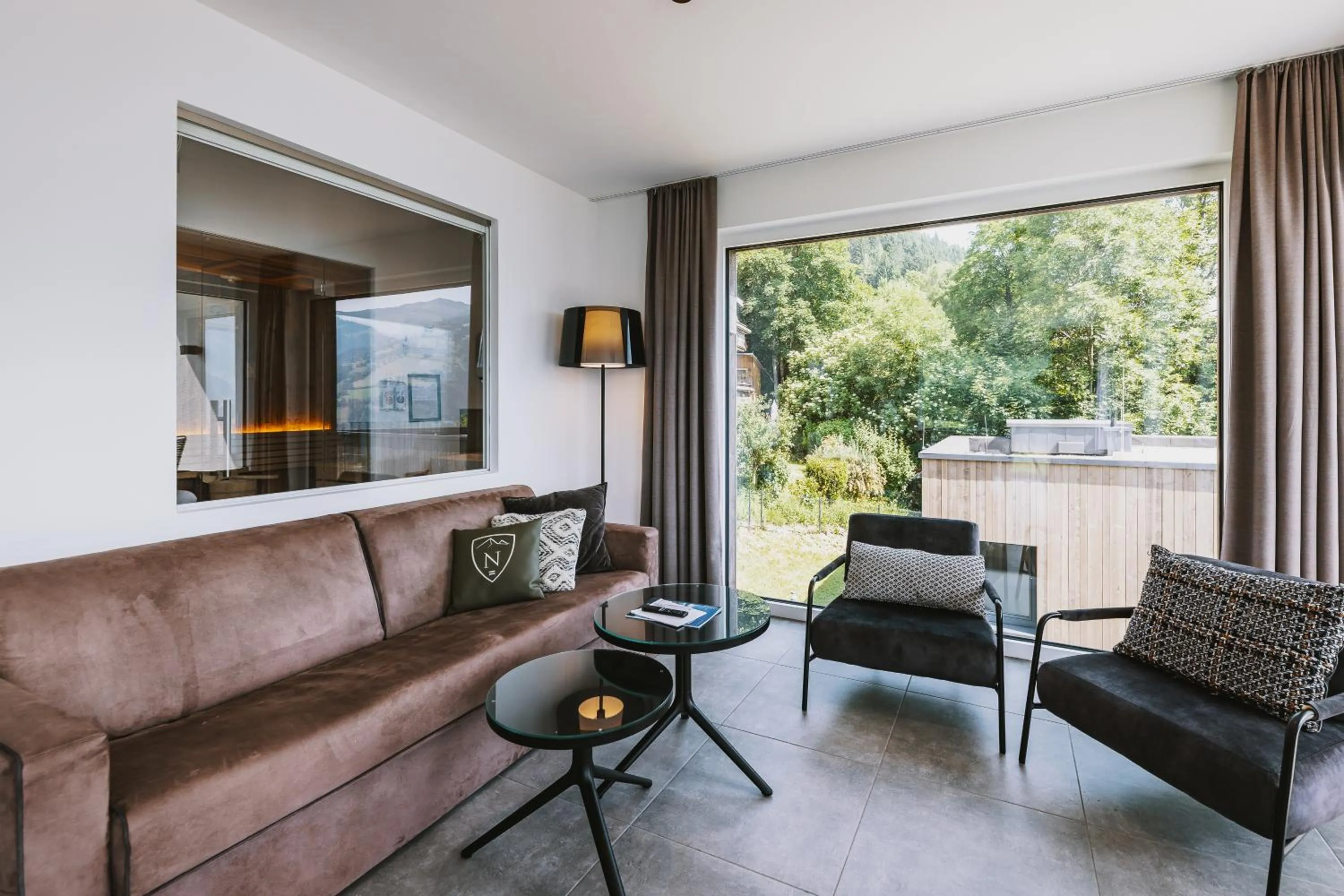 Living room in Nikolaus by AvenidA Panoramic Wellness Suites