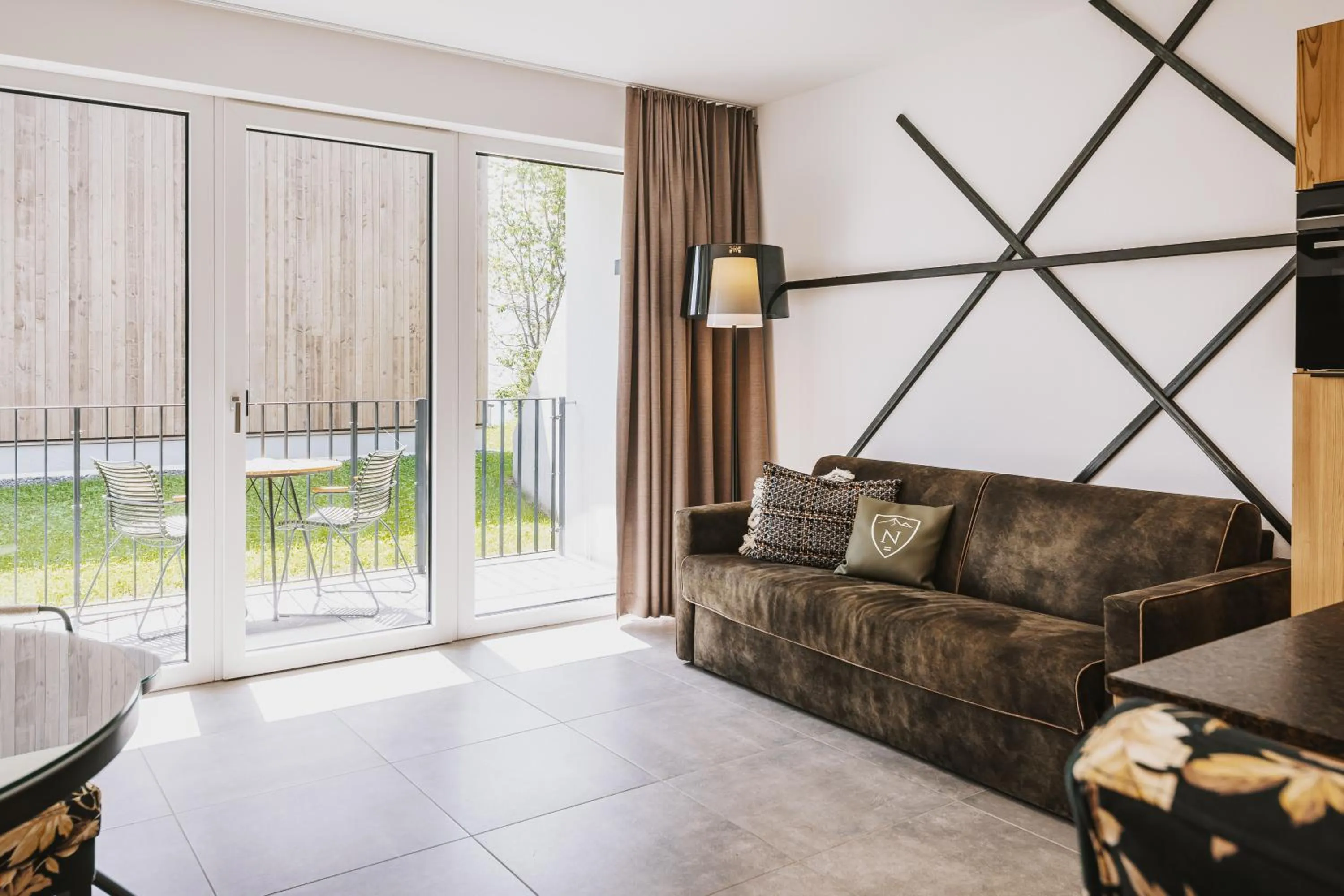 Living room in Nikolaus by AvenidA Panoramic Wellness Suites